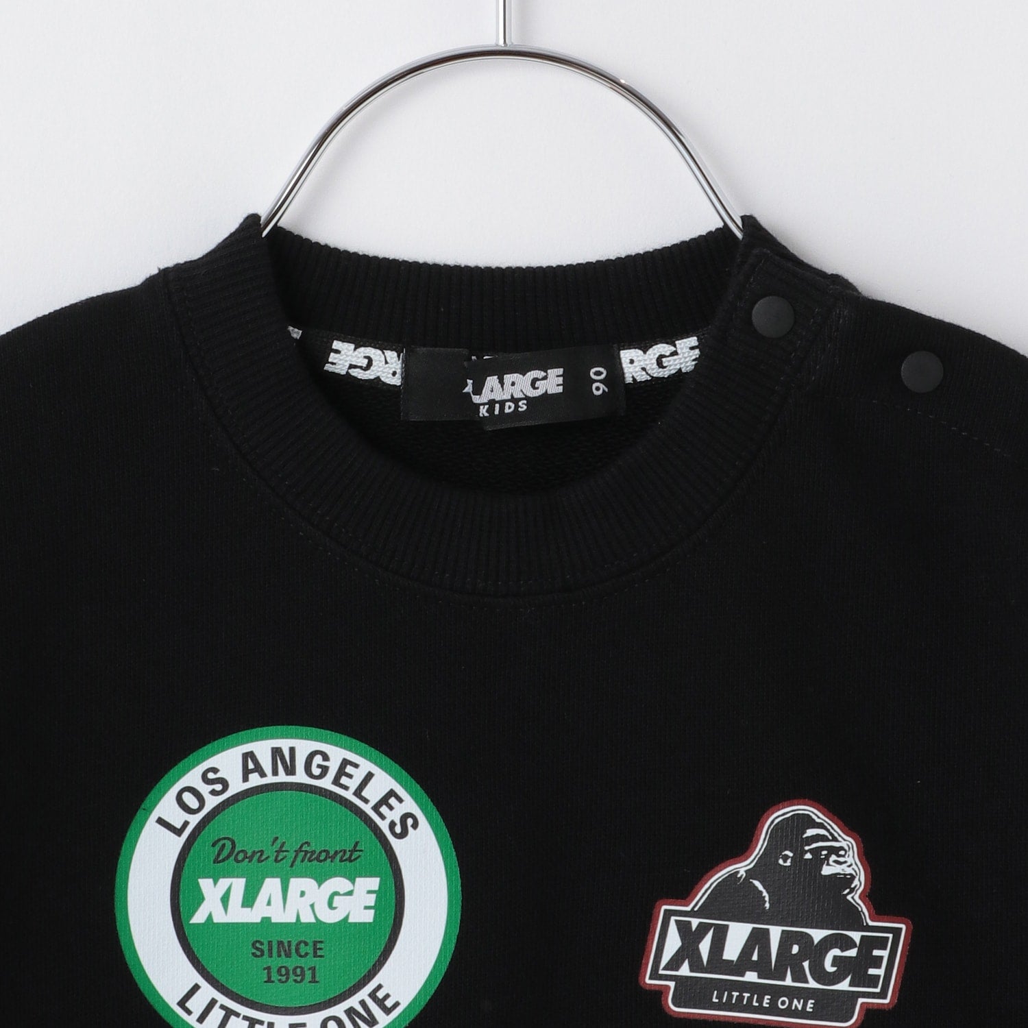 カレッジワッペンプリントトレーナー