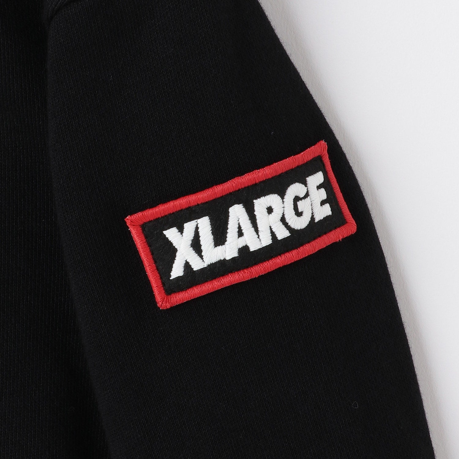 カレッジワッペンプリントトレーナー