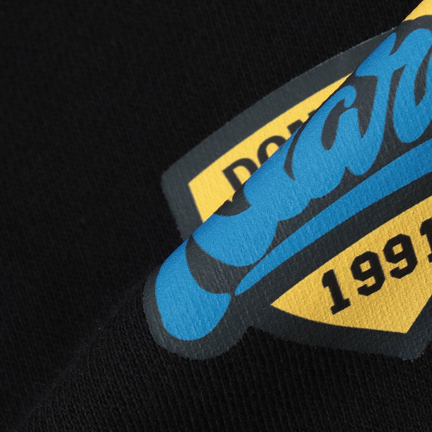 カレッジワッペンプリントトレーナー