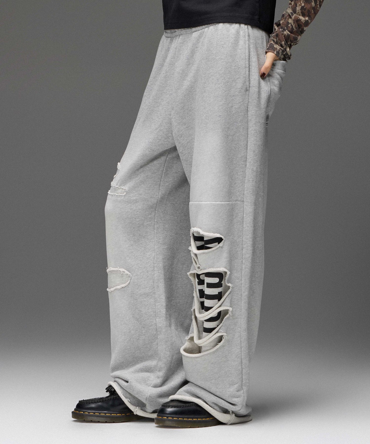 LAYERED DISTRESSED SWEATPANTS