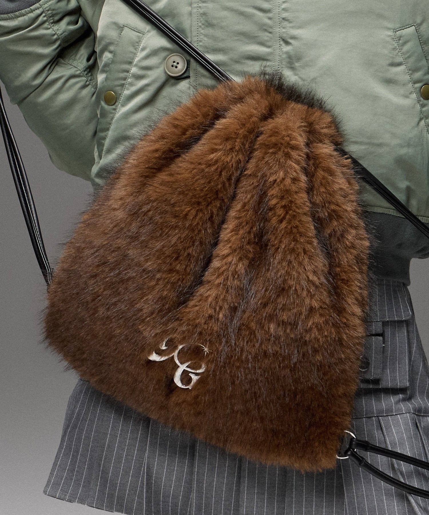 FAUX FUR METAL BUCKLE KNAPSACK