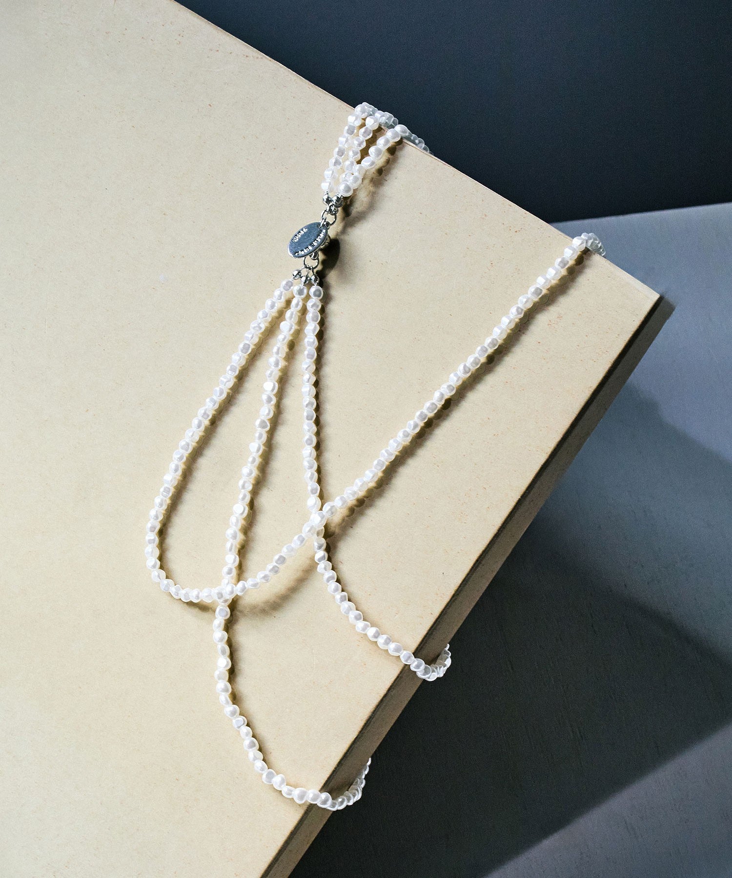 THREE STRAND PEARL NECKLACE