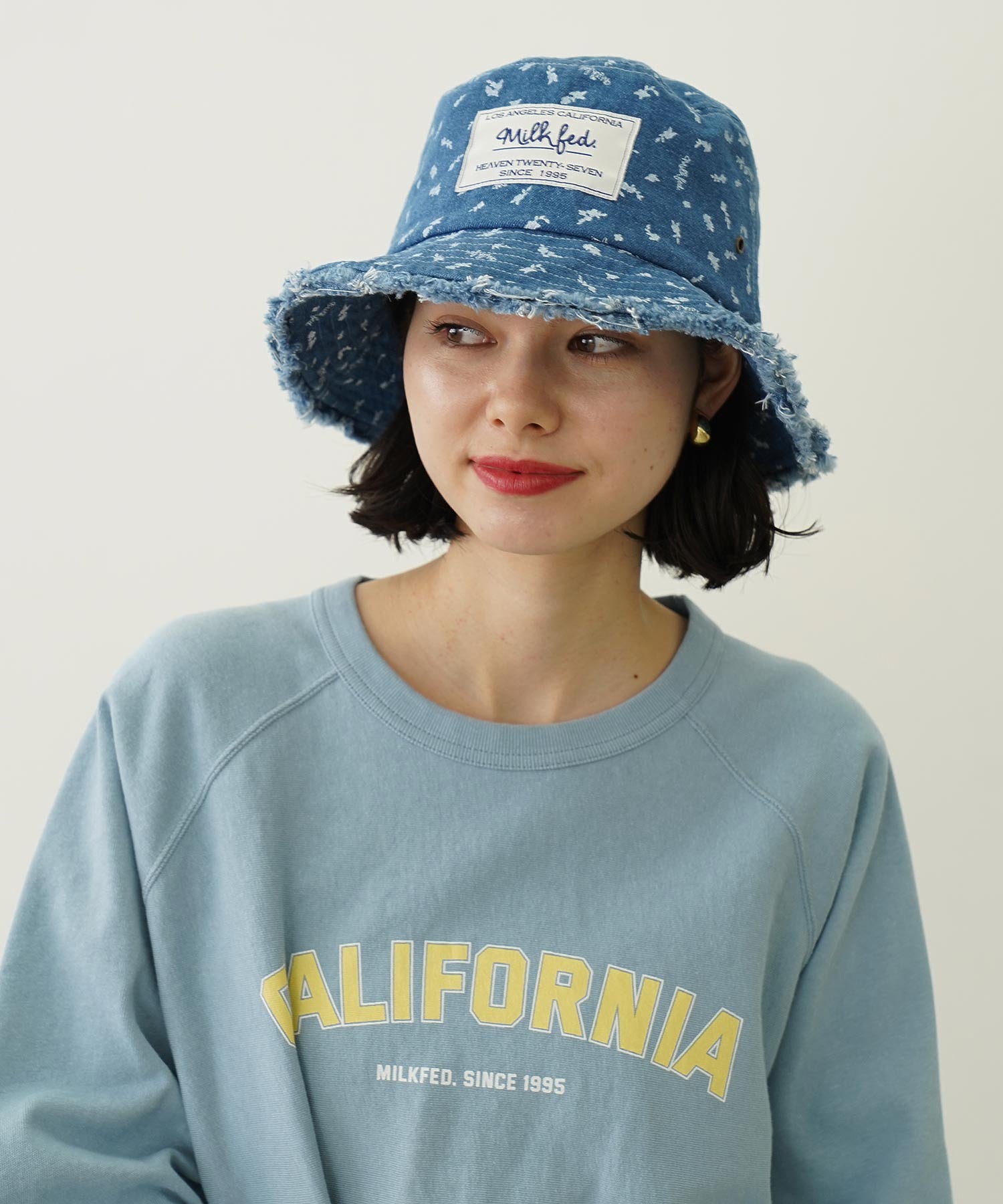 FLORAL PATTERN DENIM FRINGE BUCKET HAT