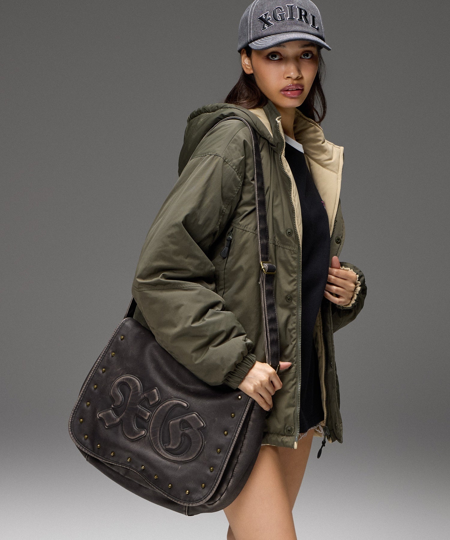 XG LOGO PATCH STUDDED FAUX LEATHER SHOULDER BAG