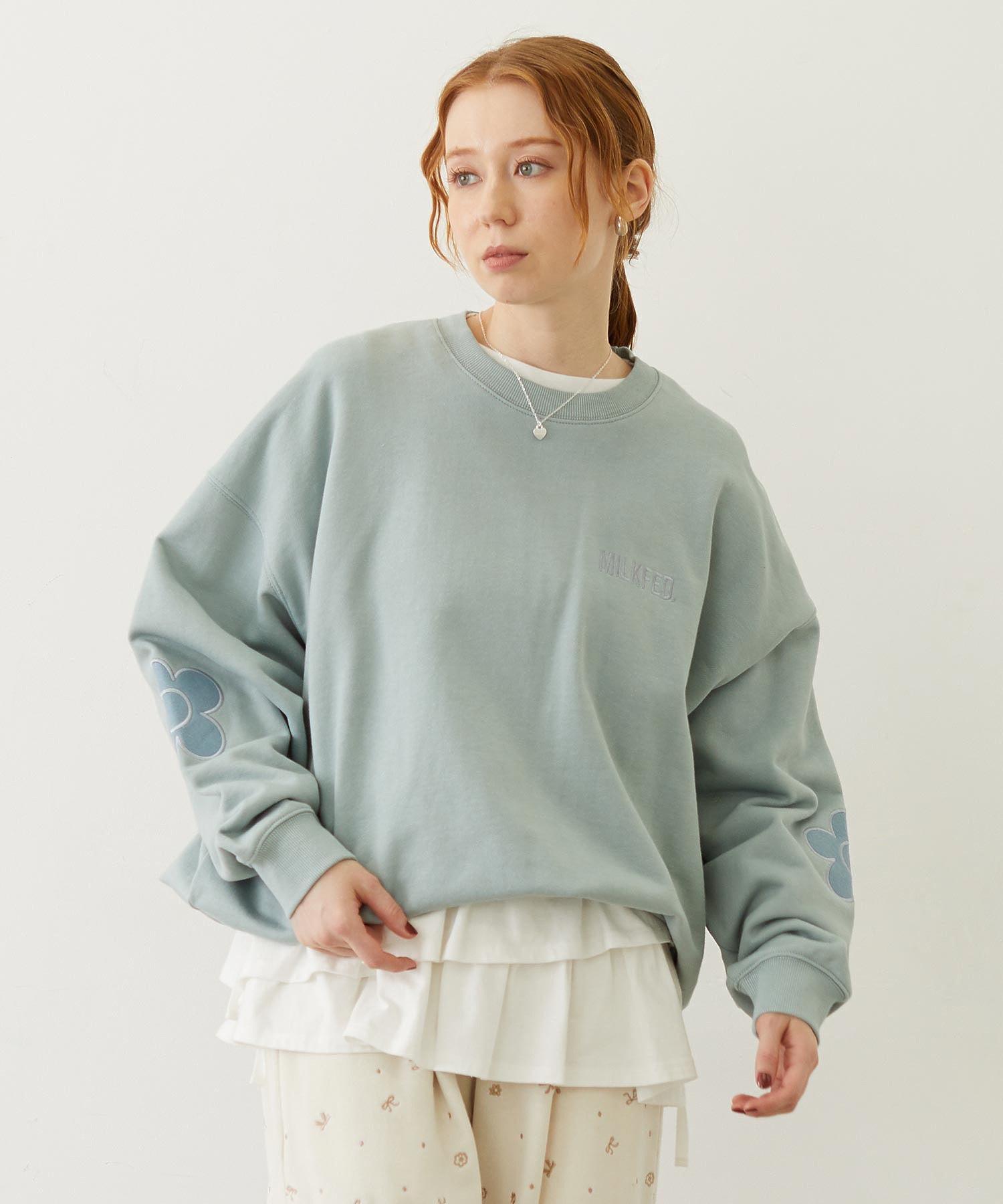 FLOWER ELBOW PATCH SWEAT TOP