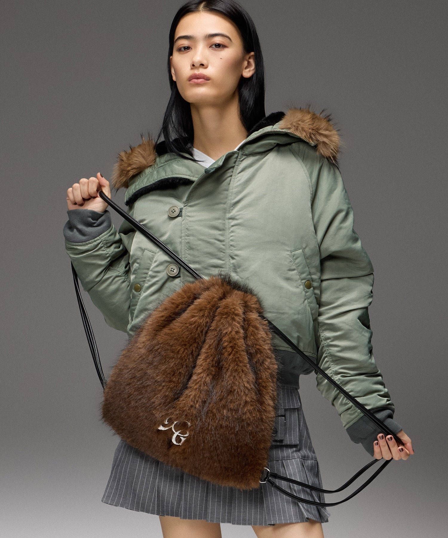 FAUX FUR METAL BUCKLE KNAPSACK