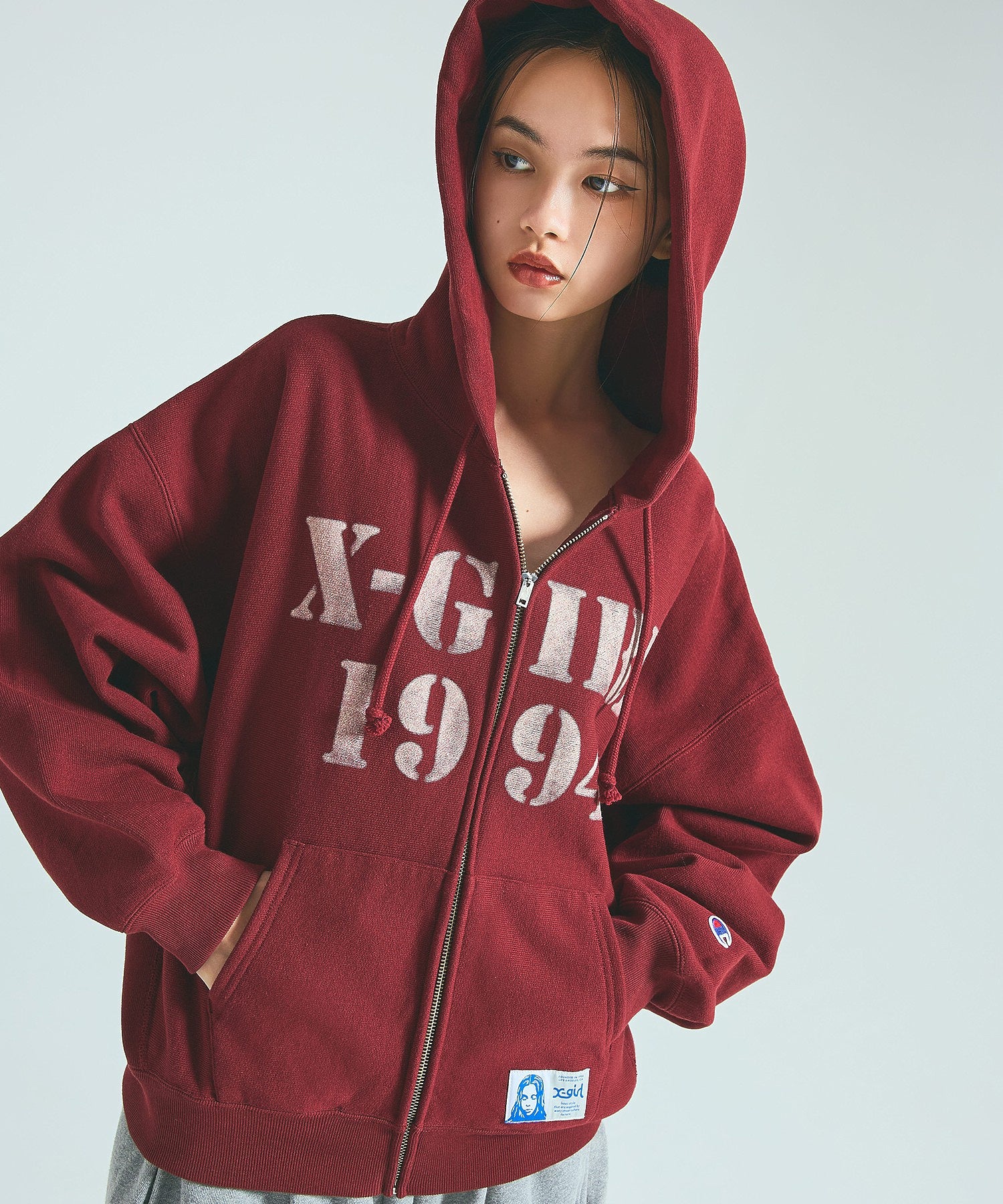 X-girl × Champion REVERSE WEAVE STENCIL LOGO ZIP UP HOODIE