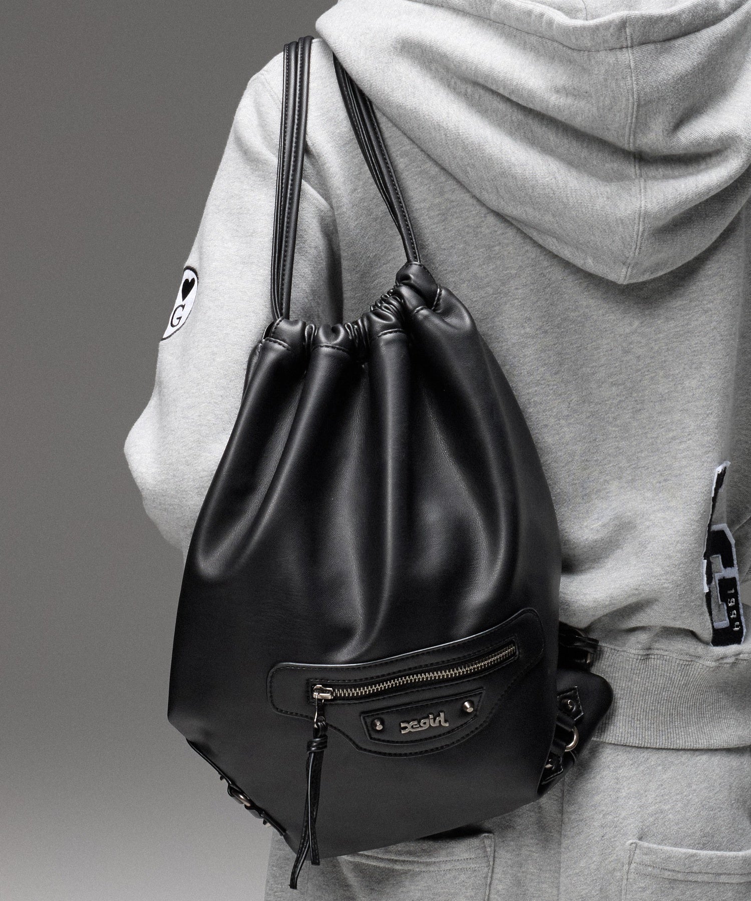 FAUX LEATHER UTILITY KNAPSACK