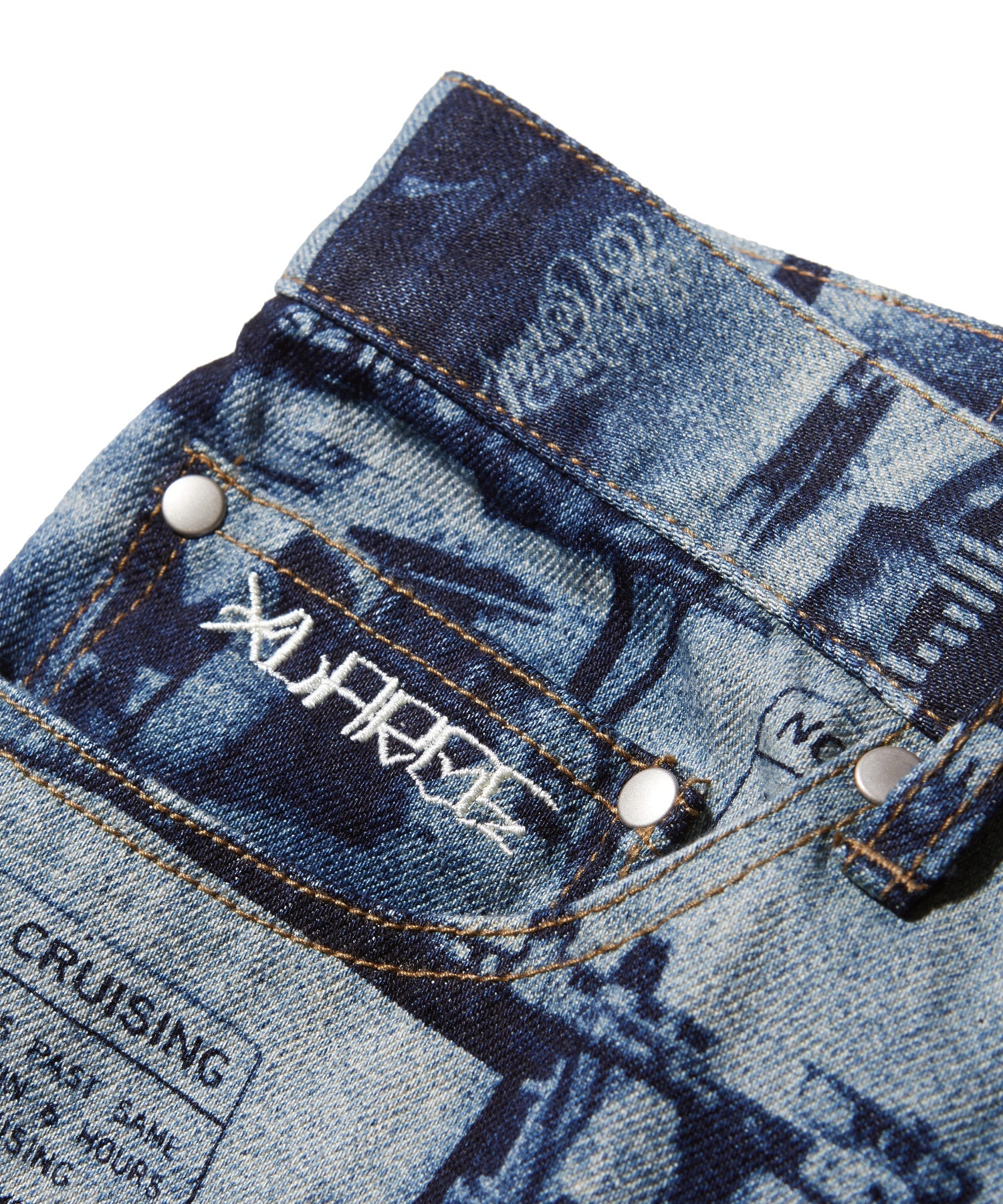 XLARGE×ESTEVAN ORIOL ALLOVER PRINT DENIM PANTS
