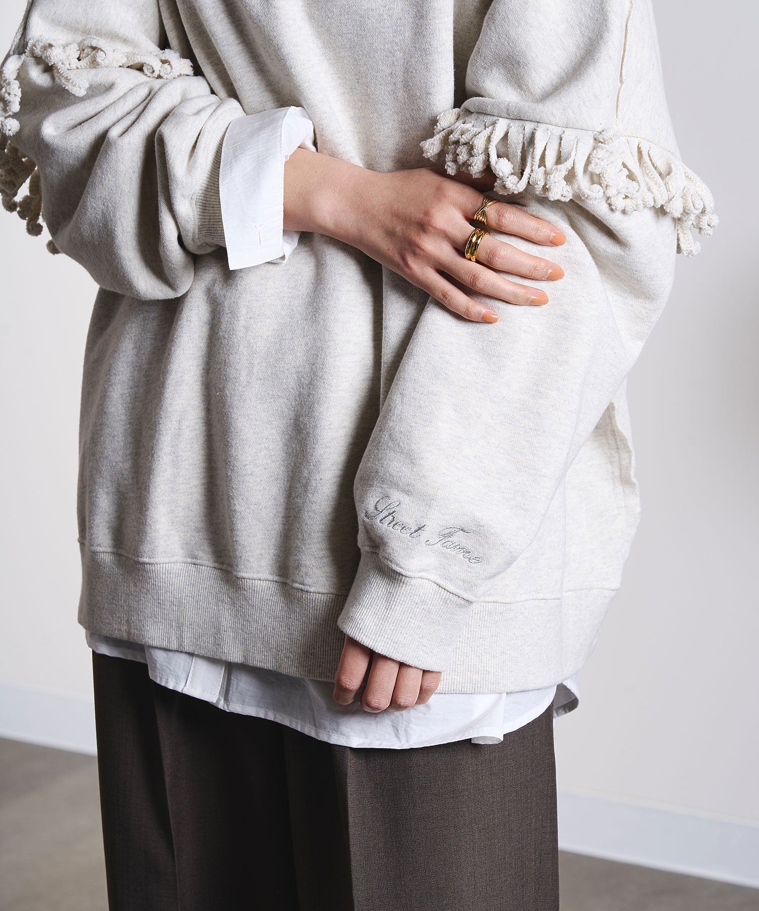 GENE HEAVENS/FRONT AND BACK FRINGE SWEAT