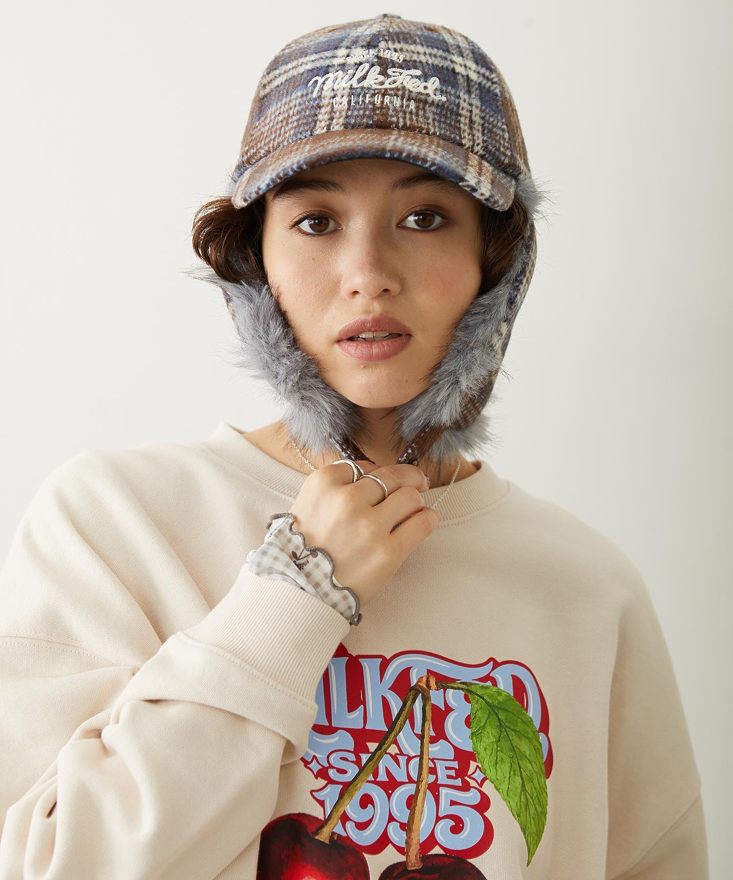 PLAID PATTERN FUR EAR FLAP