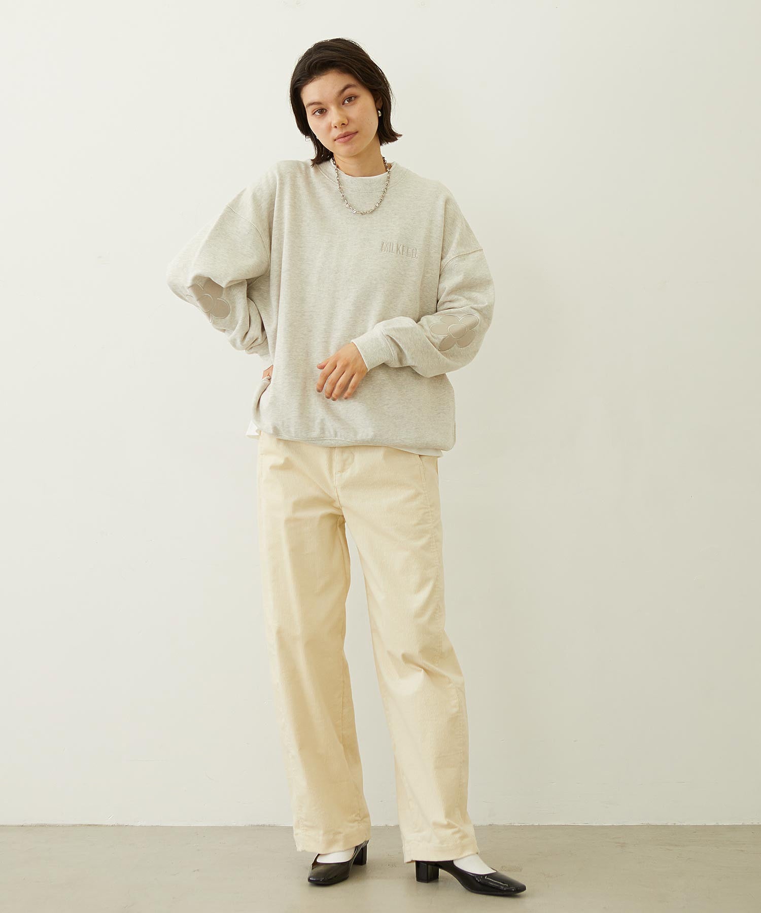 FLOWER ELBOW PATCH SWEAT TOP