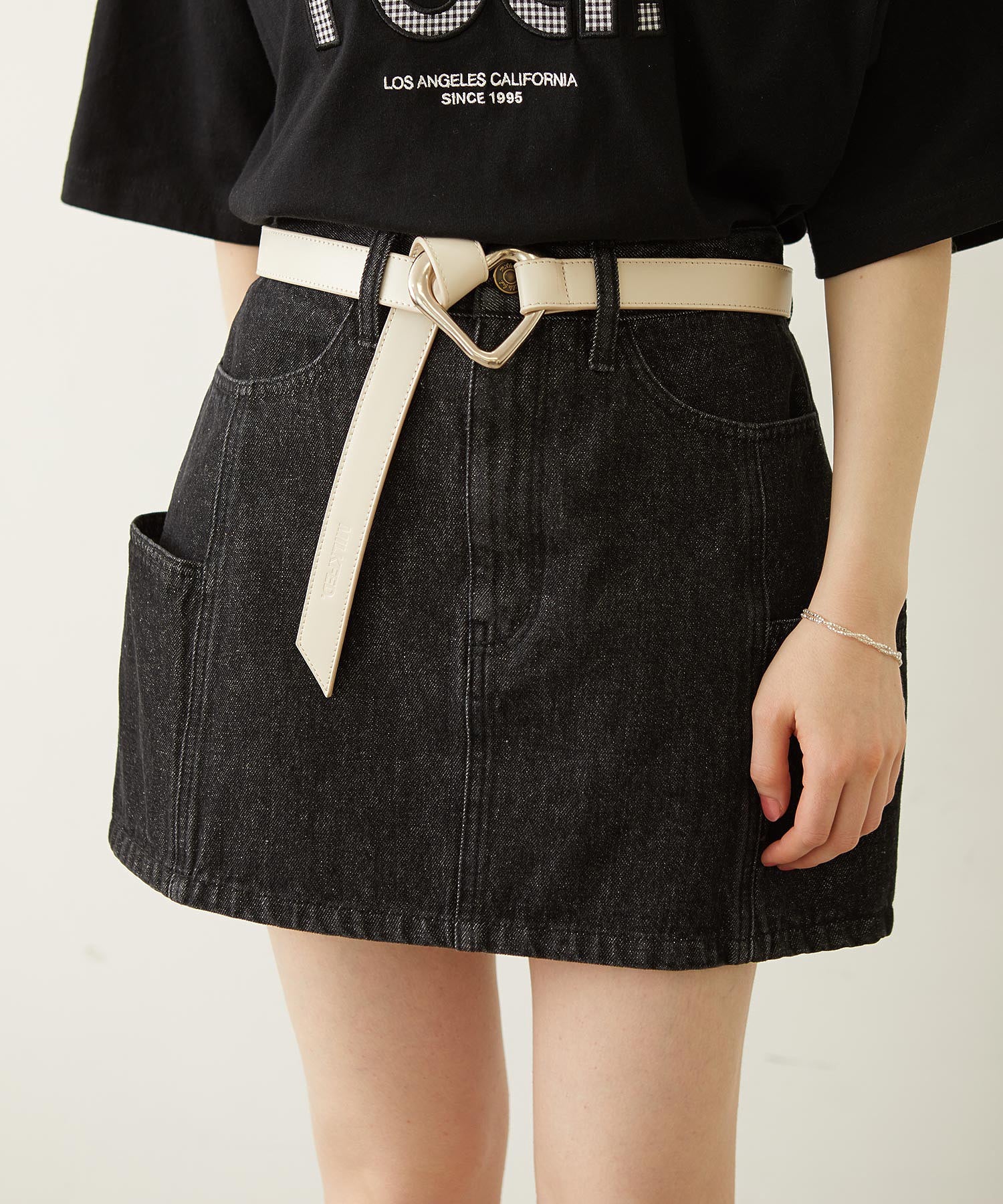 PANELED POCKET DENIM MINI SKIRT