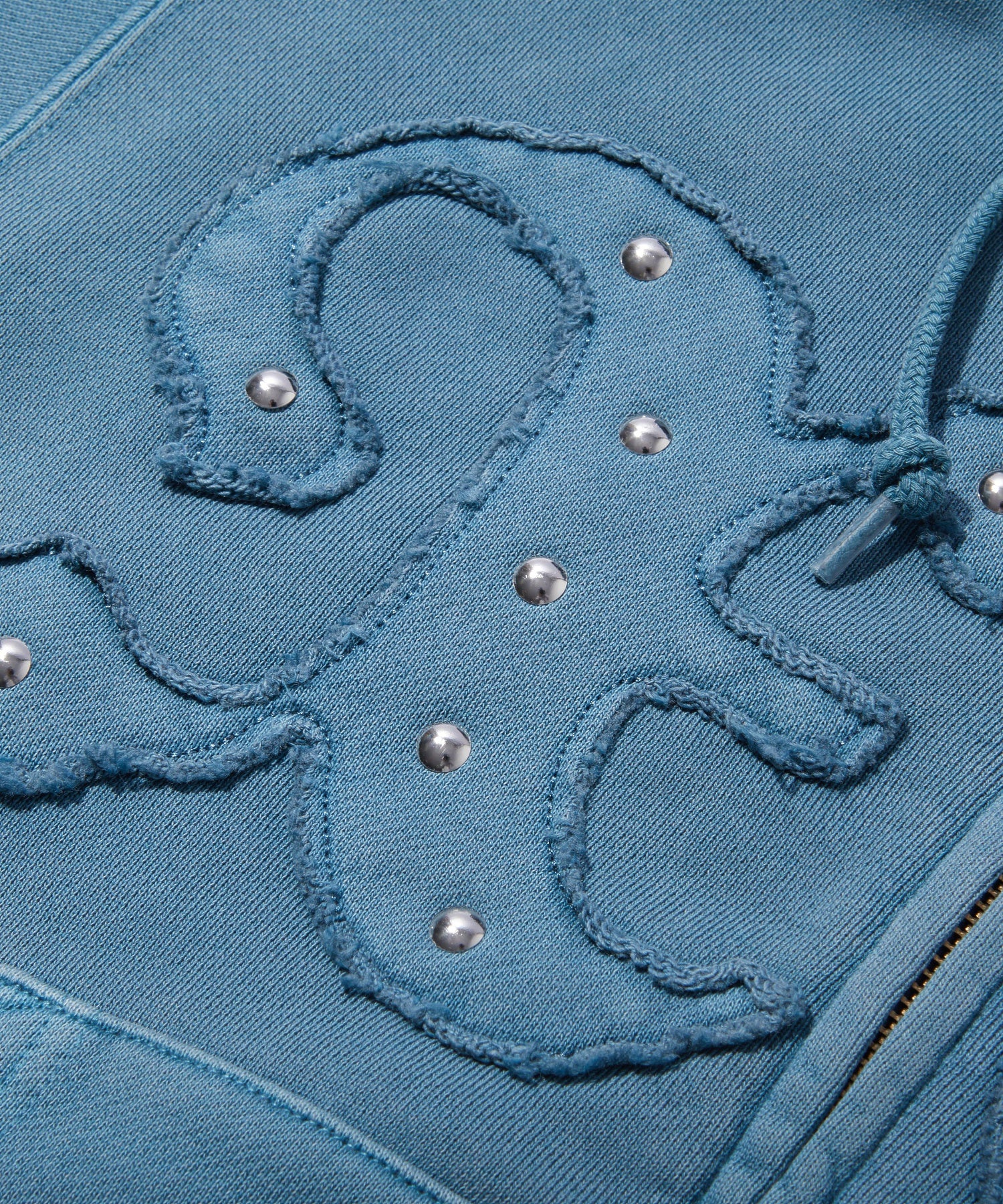 STUDDED XG LOGO ZIP UP SWEAT COMPACT HOODIE