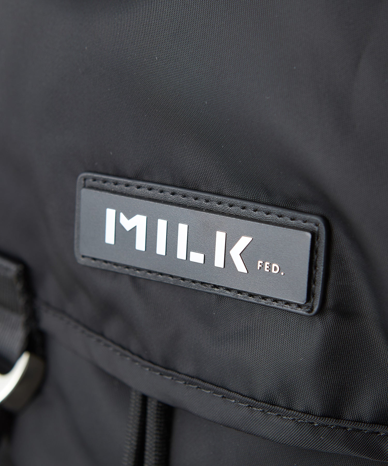 LOGO PLATE BACKPACK MILKFED.
