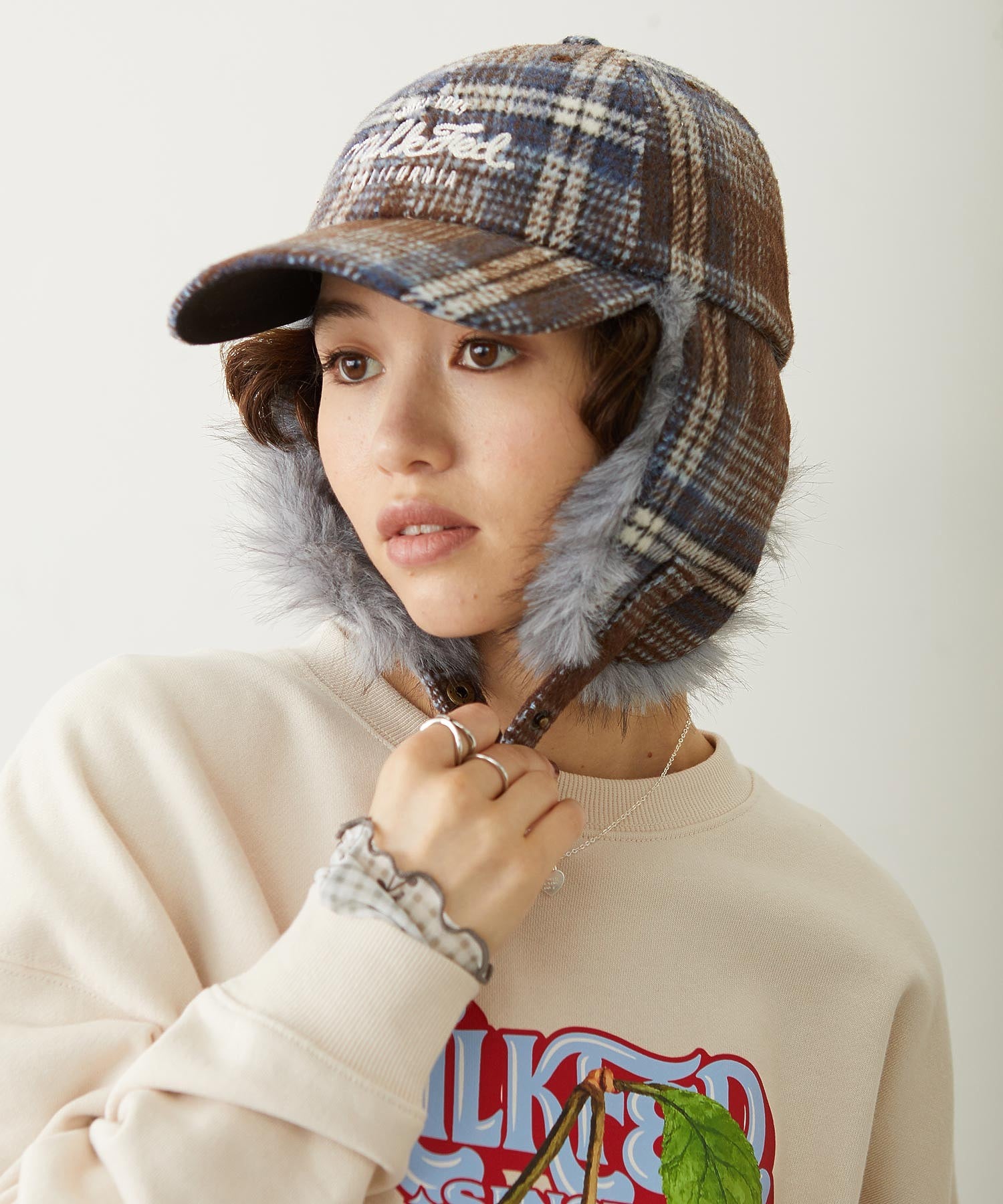 PLAID PATTERN FUR EAR FLAP