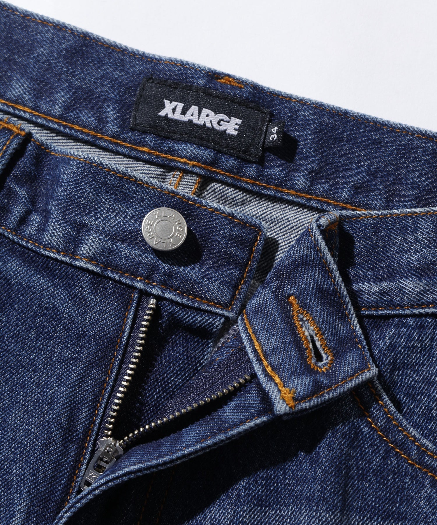 XLARGE×ED HARDY CRASH DENIM PANTS