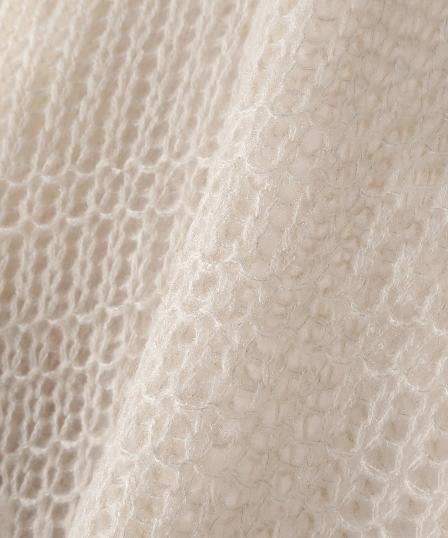 クロップドシアーニット