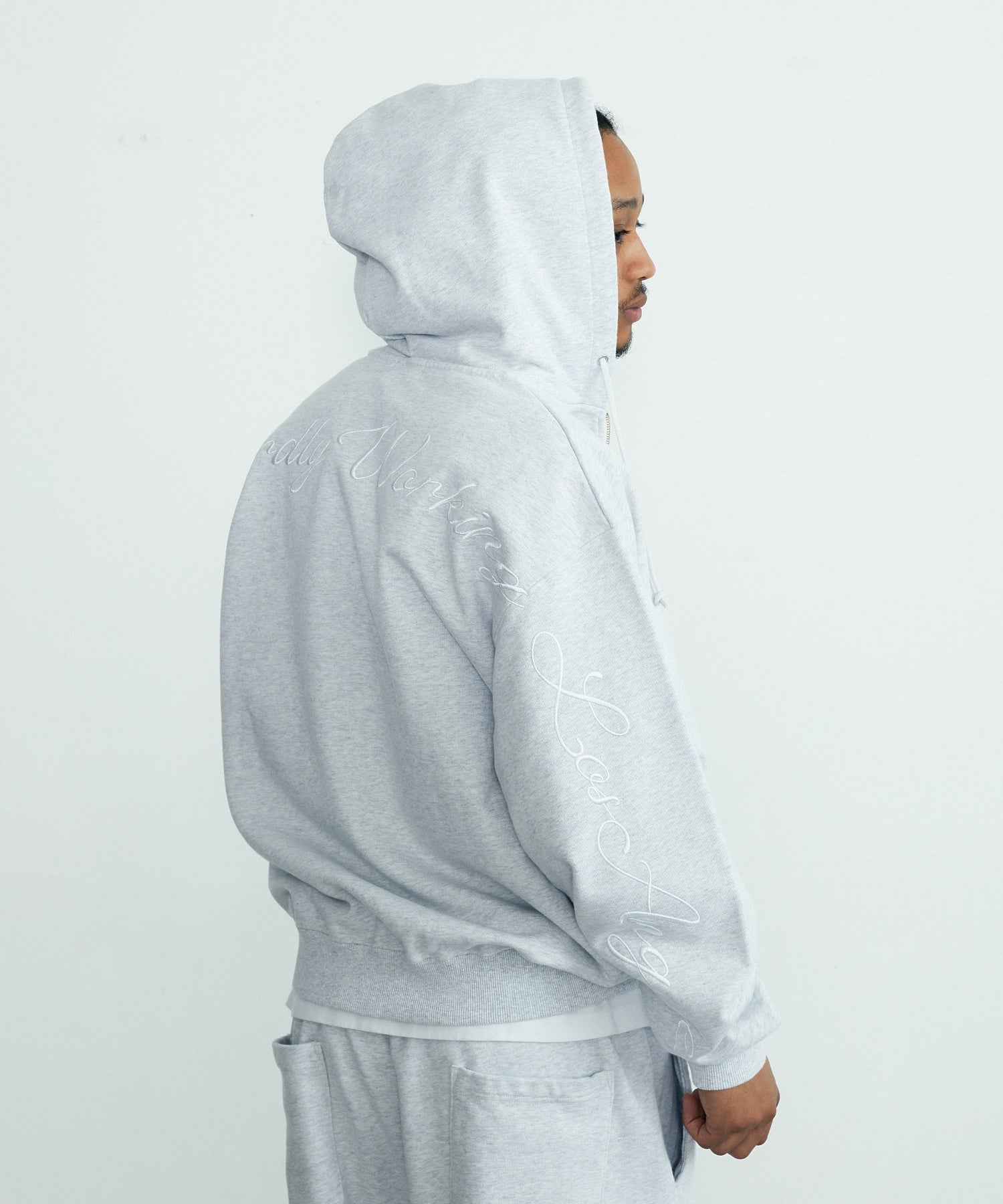CURSIVE ZIP UP HOODED SWEATSHIRT