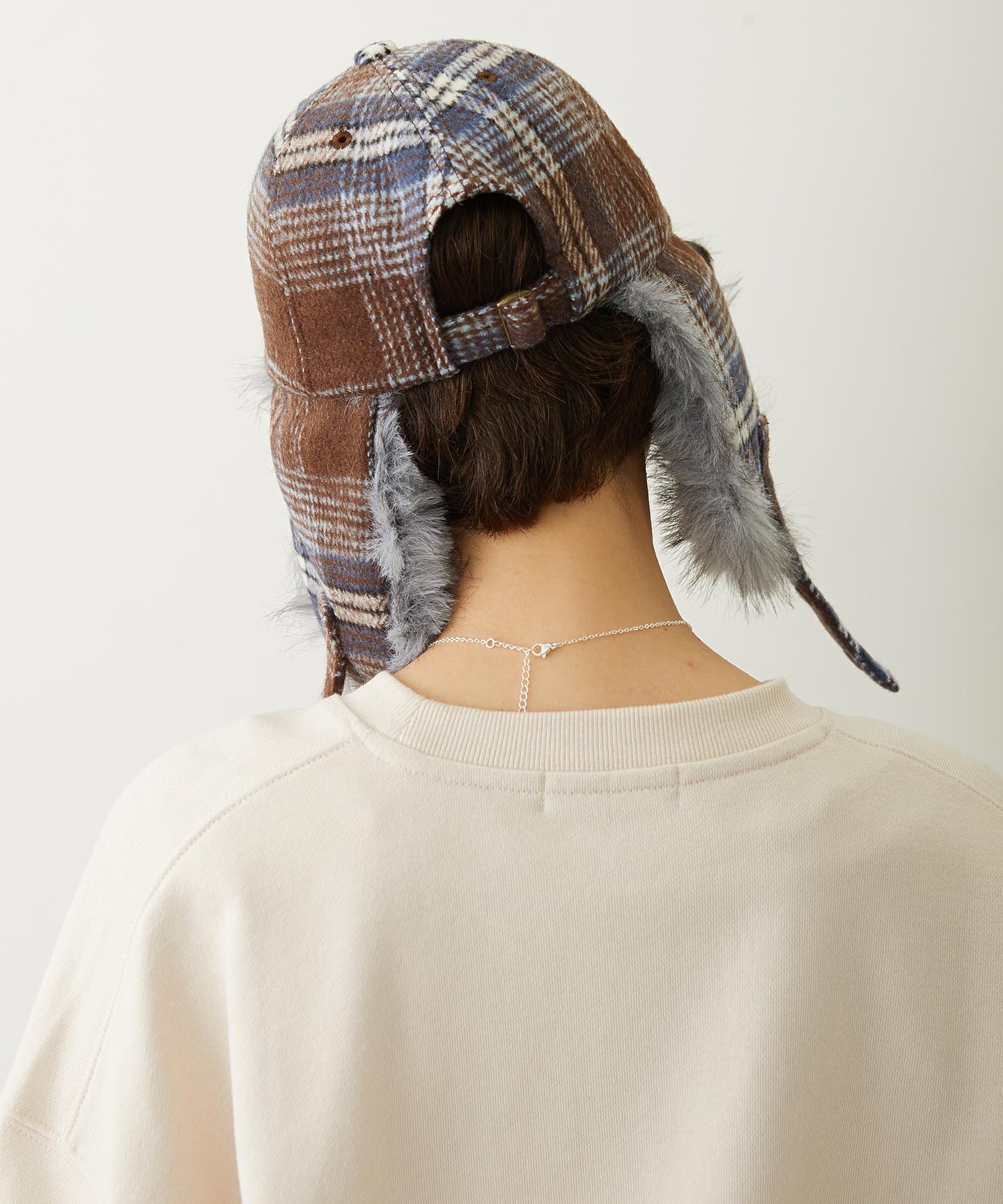 PLAID PATTERN FUR EAR FLAP