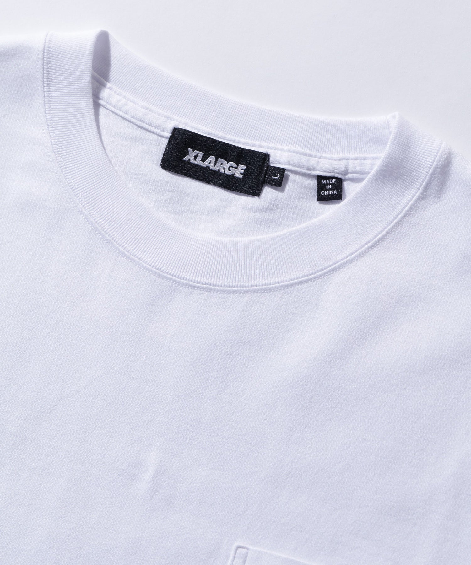 XLARGE×CRENSHAW SKATE CLUB POCKET S/S TEE