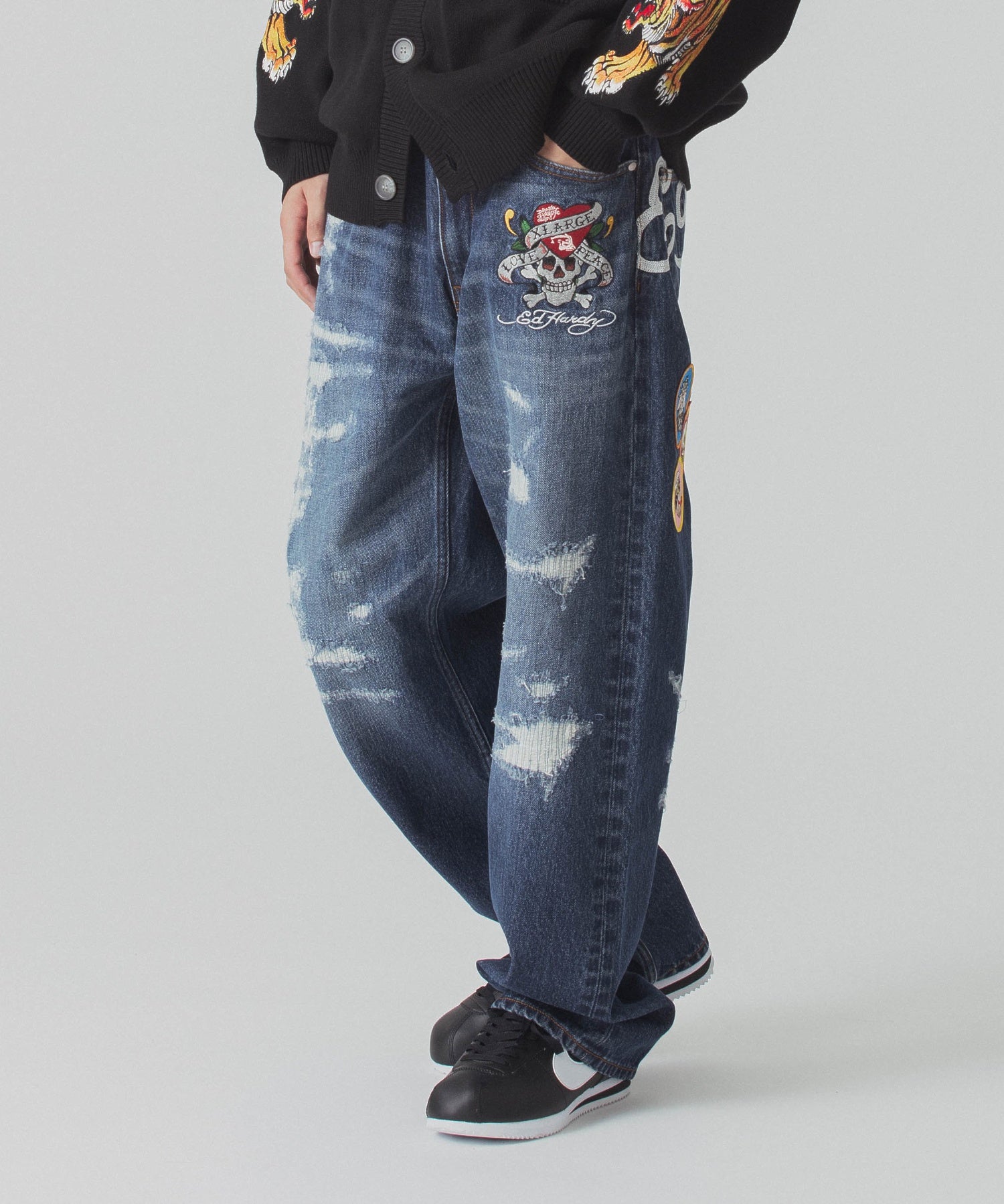 XLARGE×ED HARDY CRASH DENIM PANTS