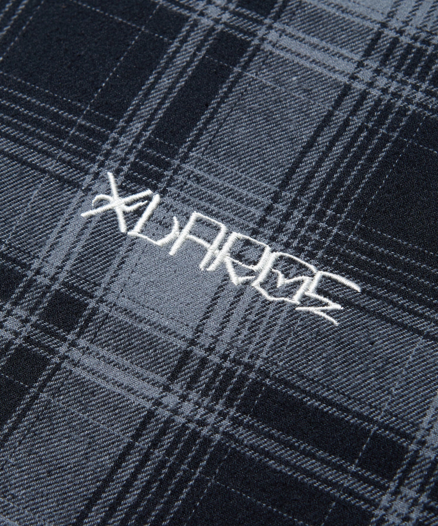 XLARGE×ESTEVAN ORIOL QUILTED HALF ZIP FLANNEL SHIRT