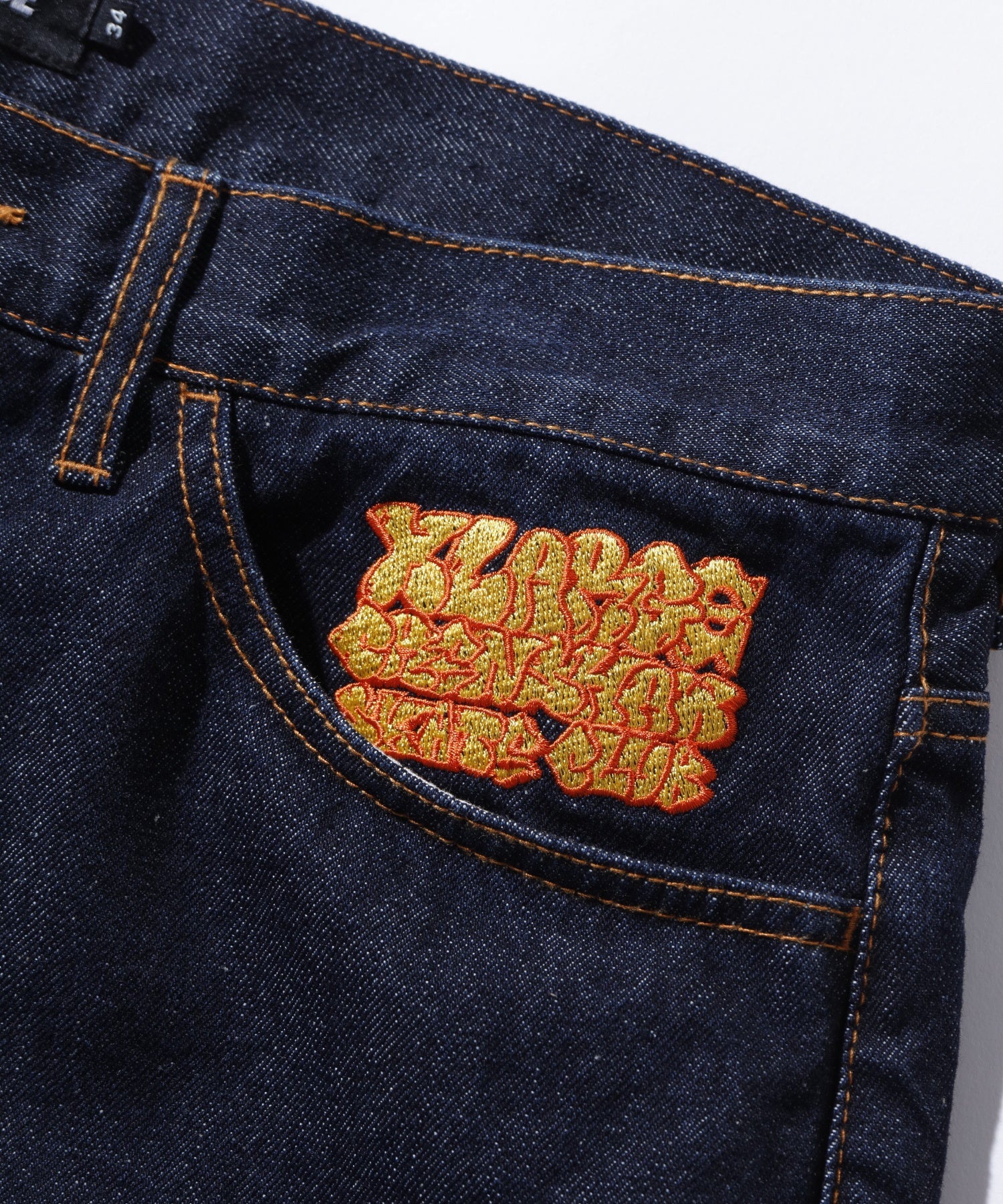 XLARGE×CRENSHAW SKATE CLUB DENIM SHORT PANTS