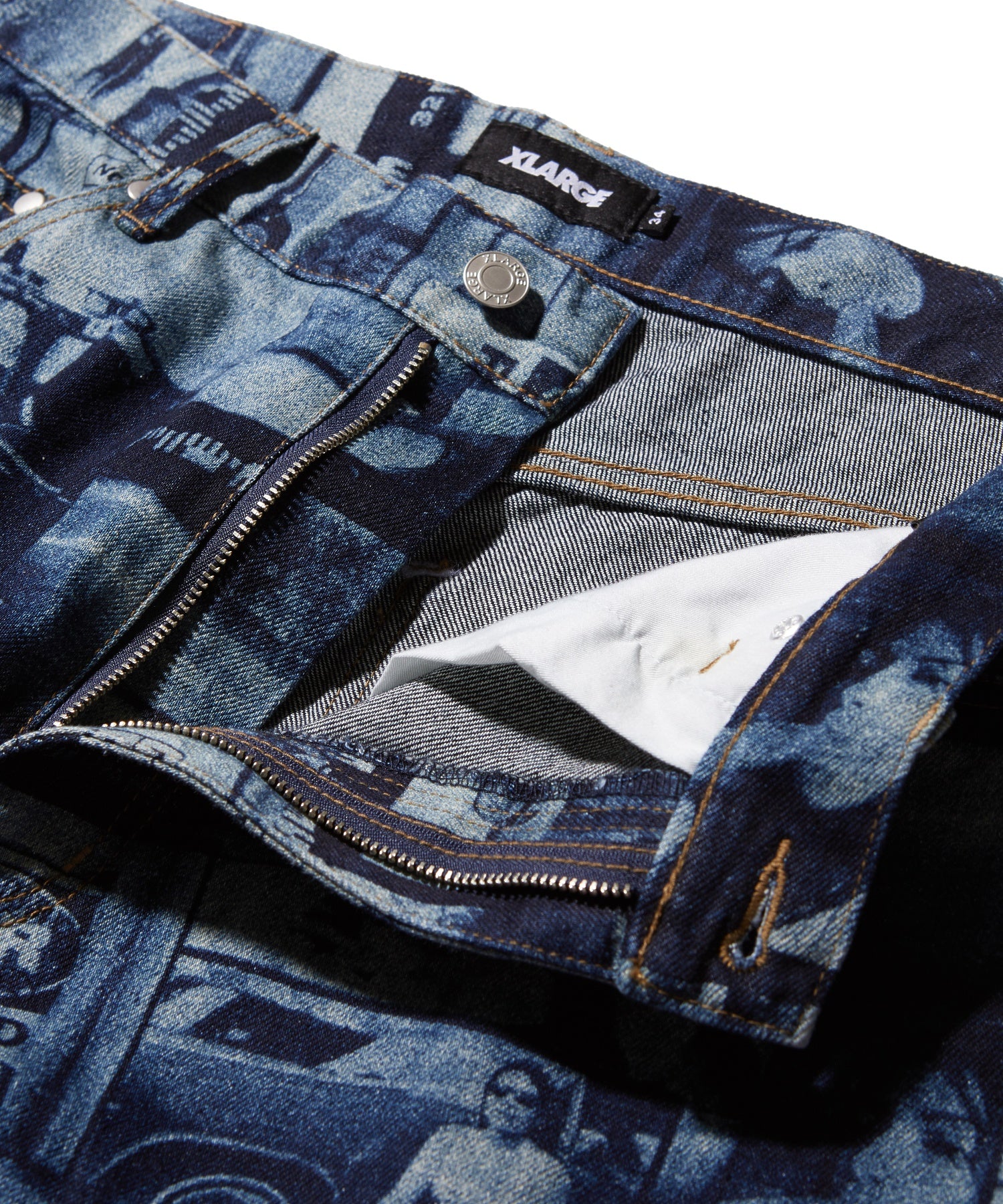 XLARGE×ESTEVAN ORIOL ALLOVER PRINT DENIM PANTS