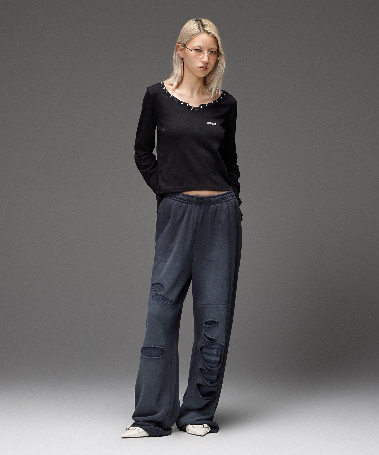 LAYERED DISTRESSED SWEATPANTS
