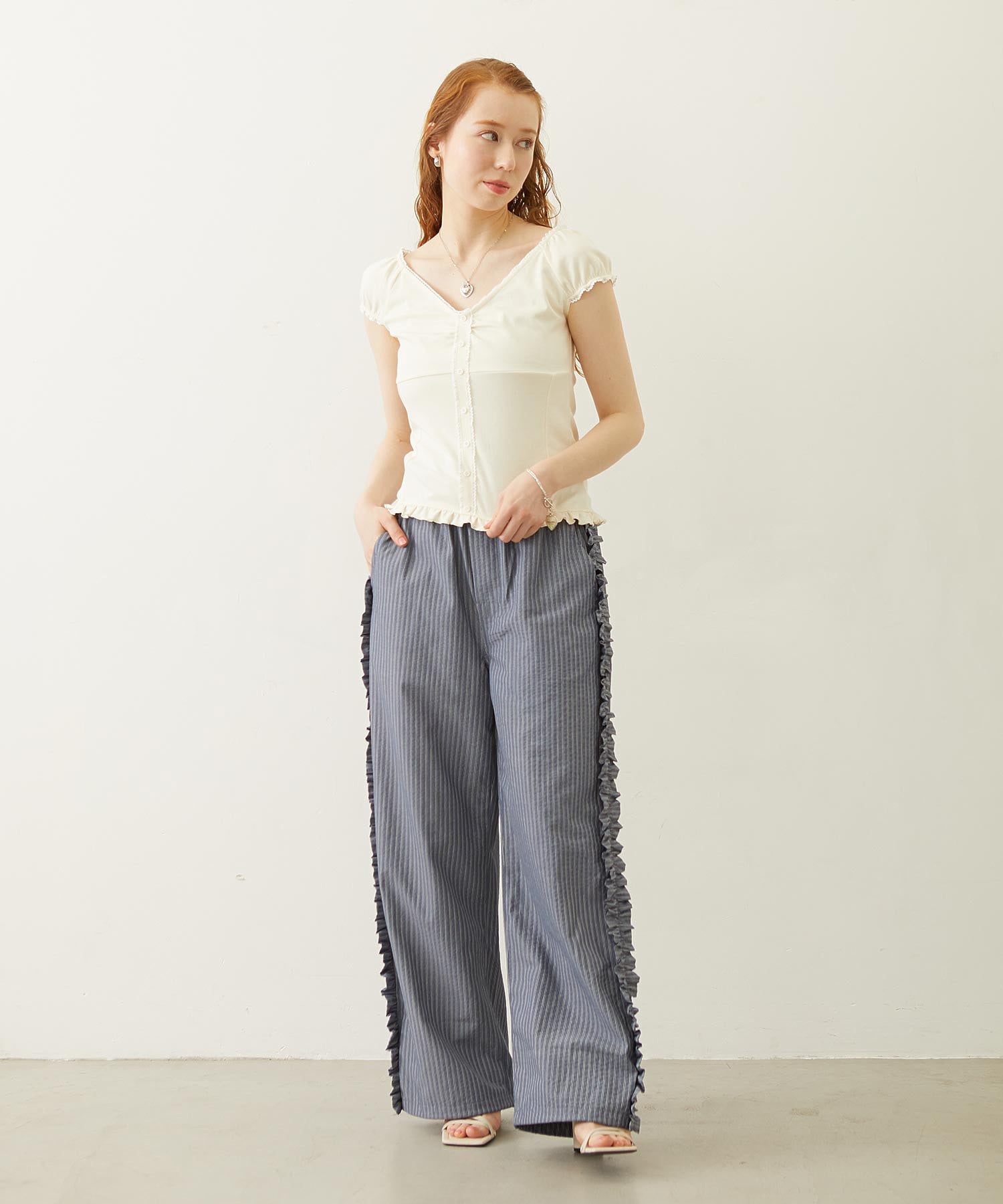 STRIPED RUFFLE PANTS
