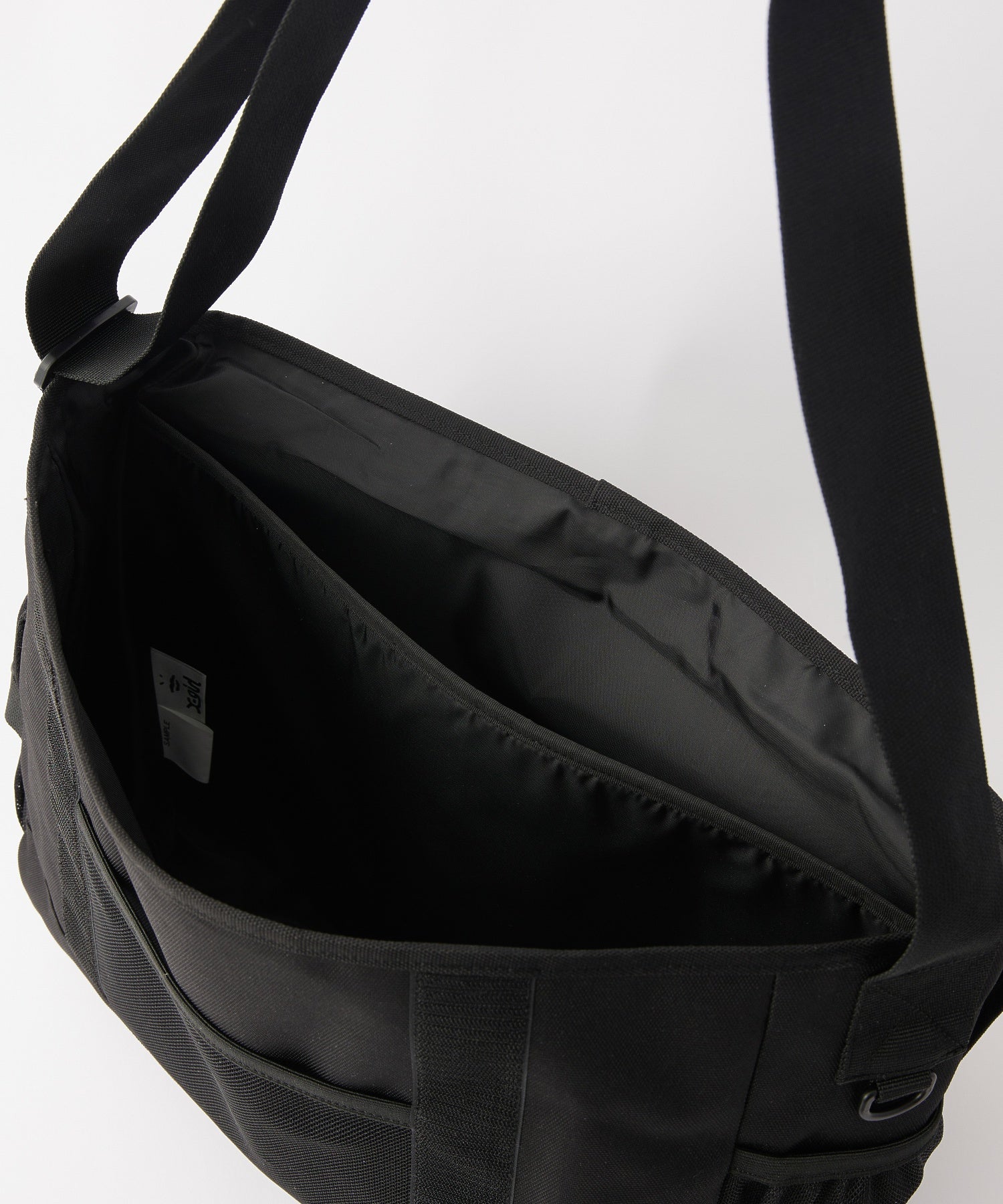 OVAL LOGO BUNGEE CORD MESSENGER BAG