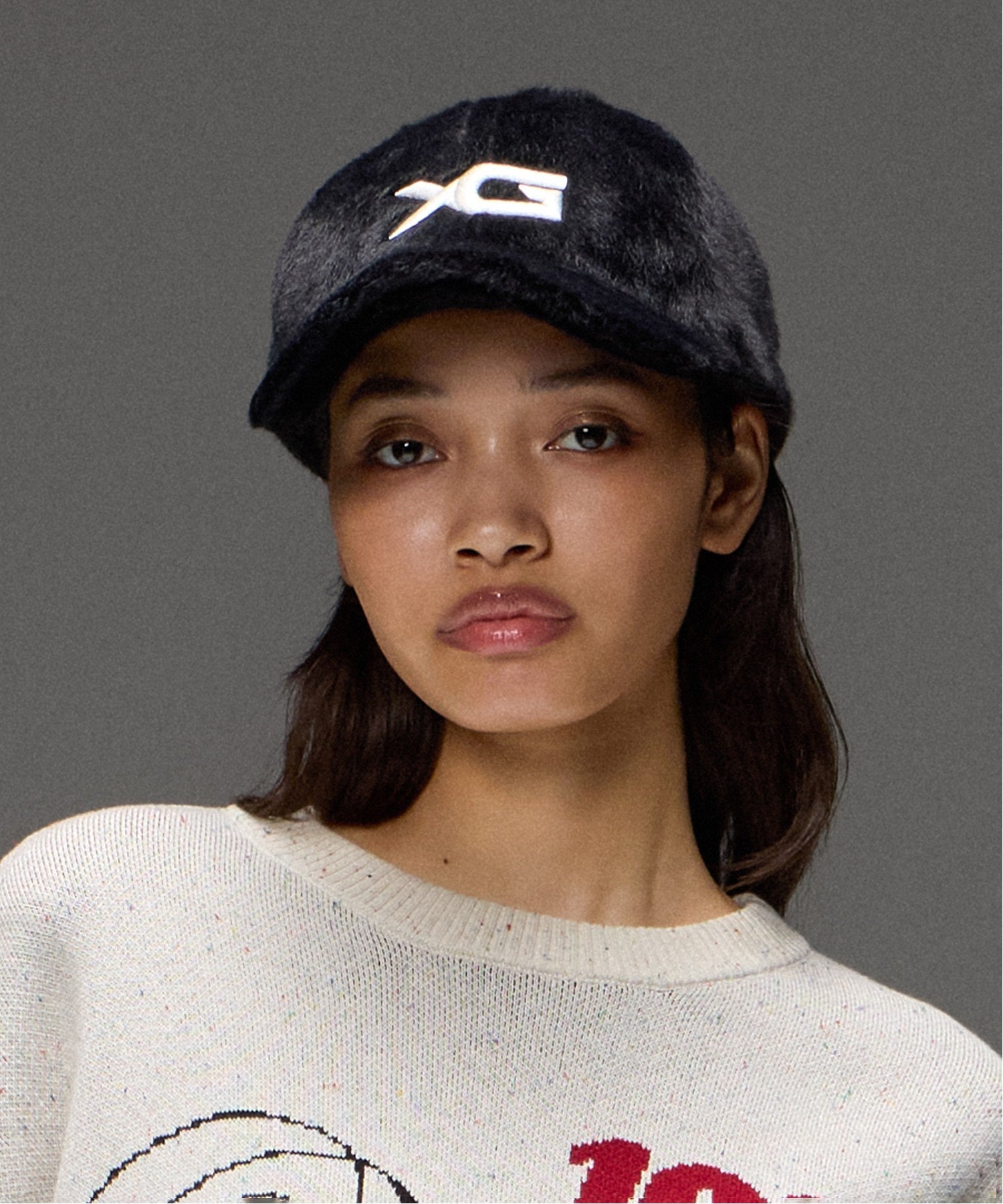 EMBROIDERED XG LOGO FUZZY CAP