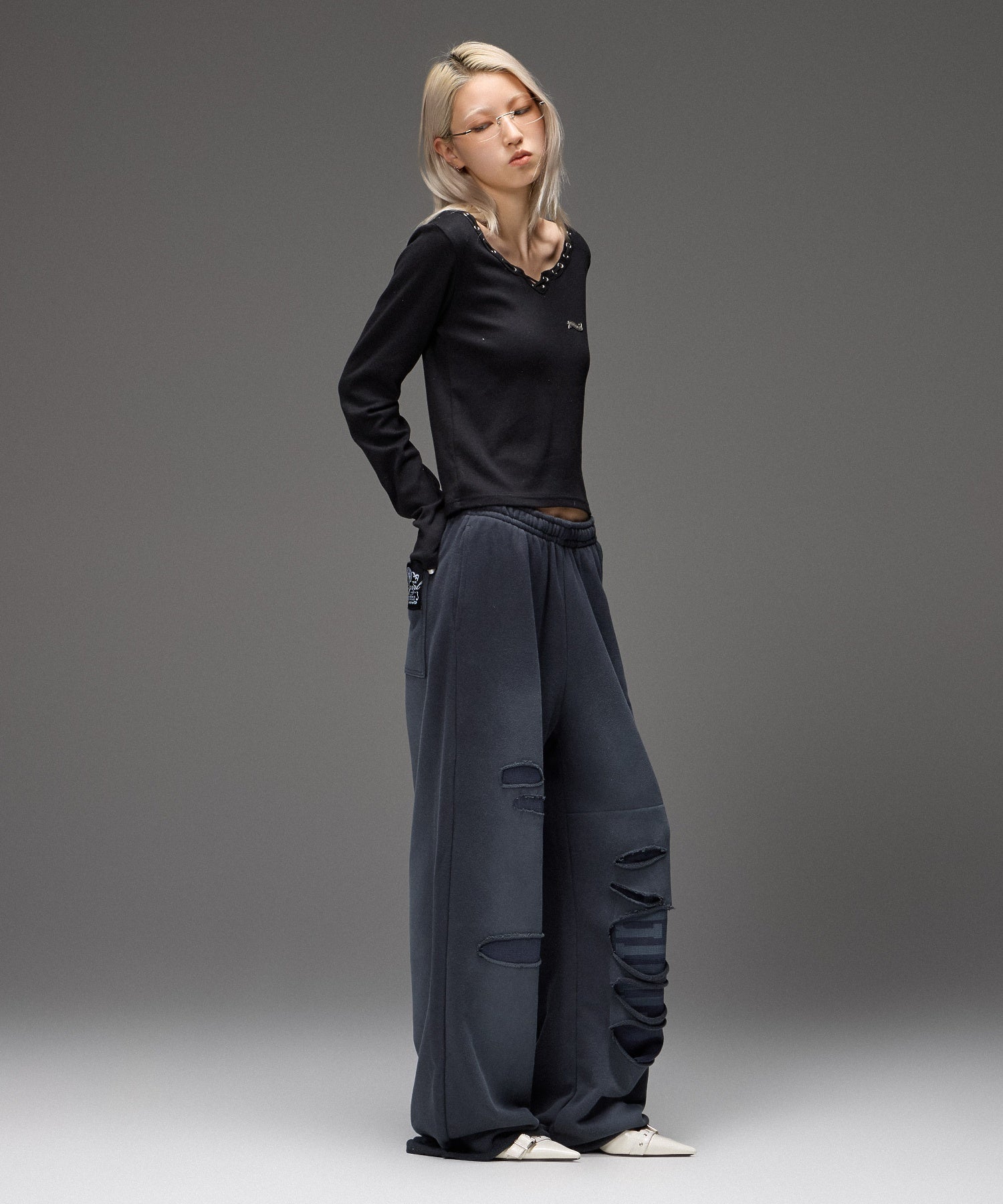 LAYERED DISTRESSED SWEATPANTS
