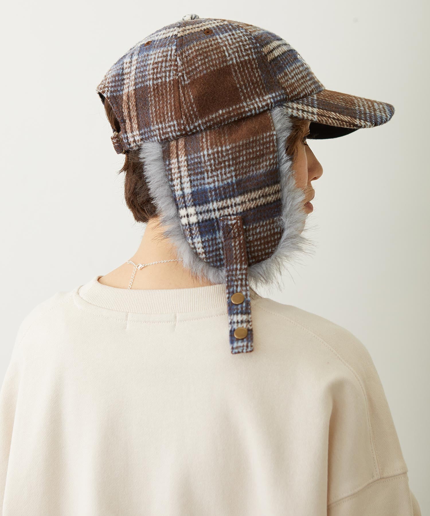 PLAID PATTERN FUR EAR FLAP