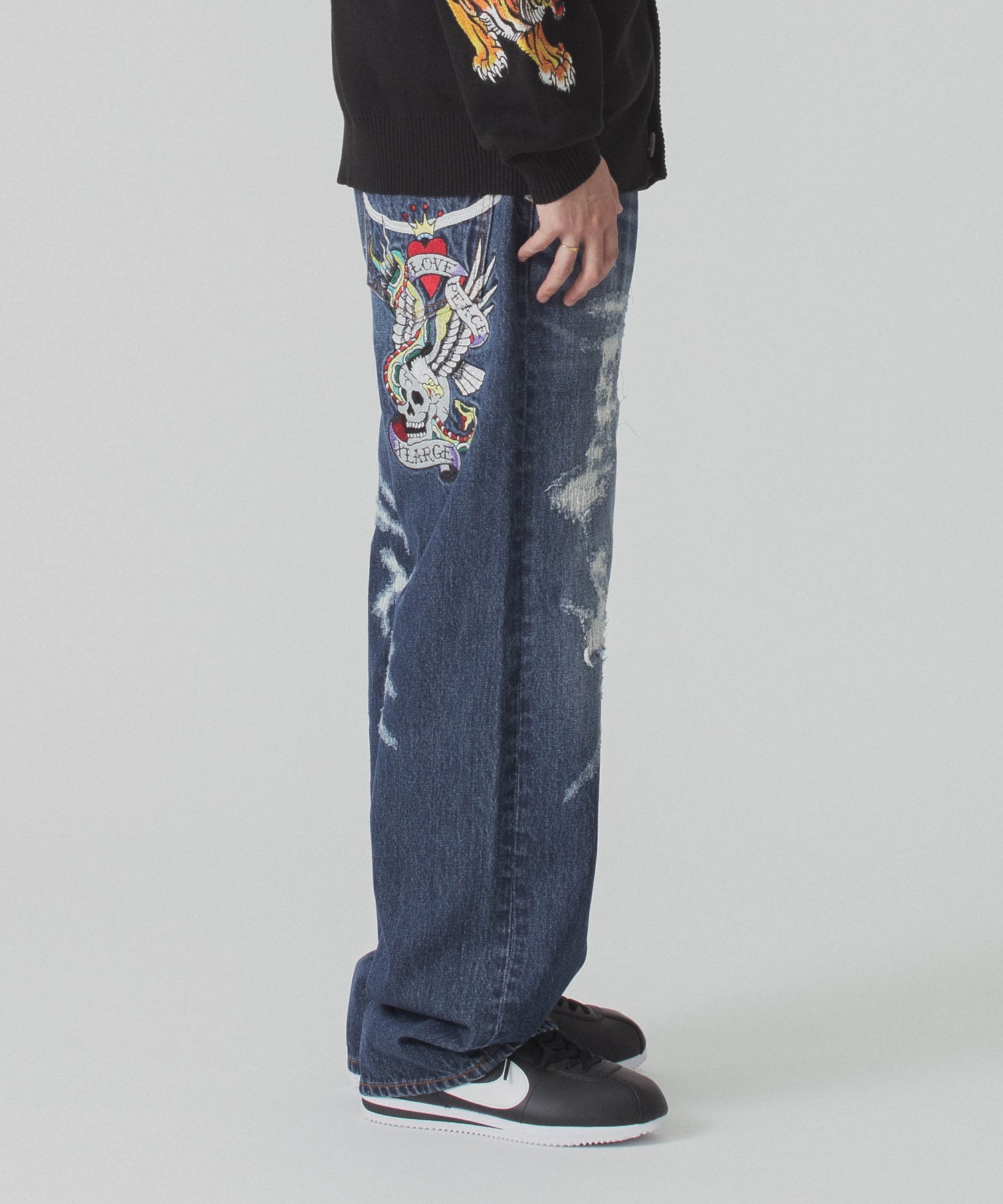 XLARGE×ED HARDY CRASH DENIM PANTS