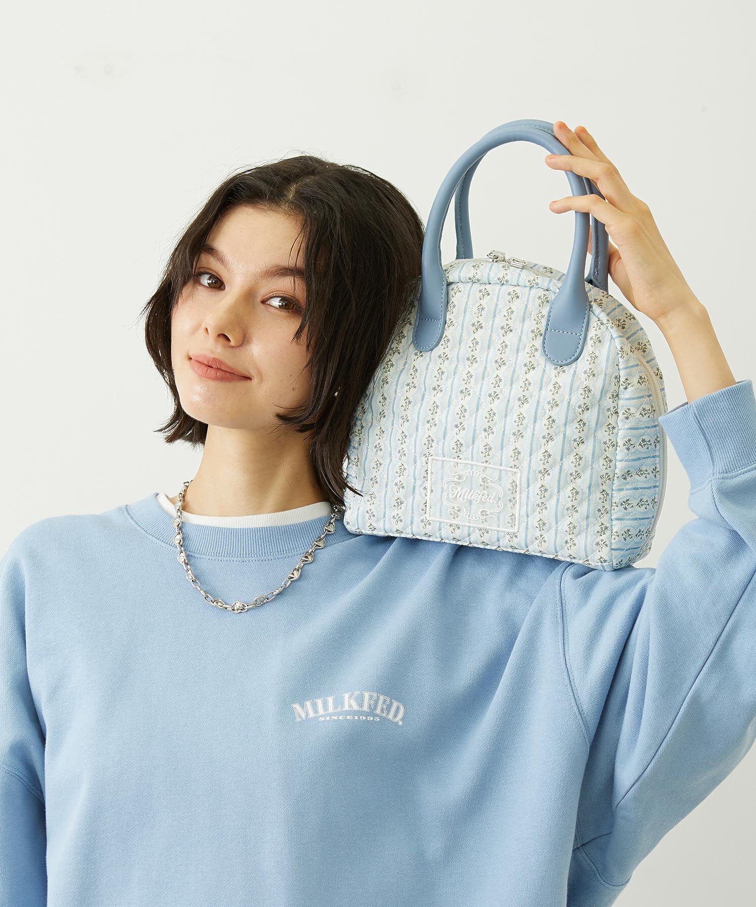 STRIPED FLOWER QUILTED BAG