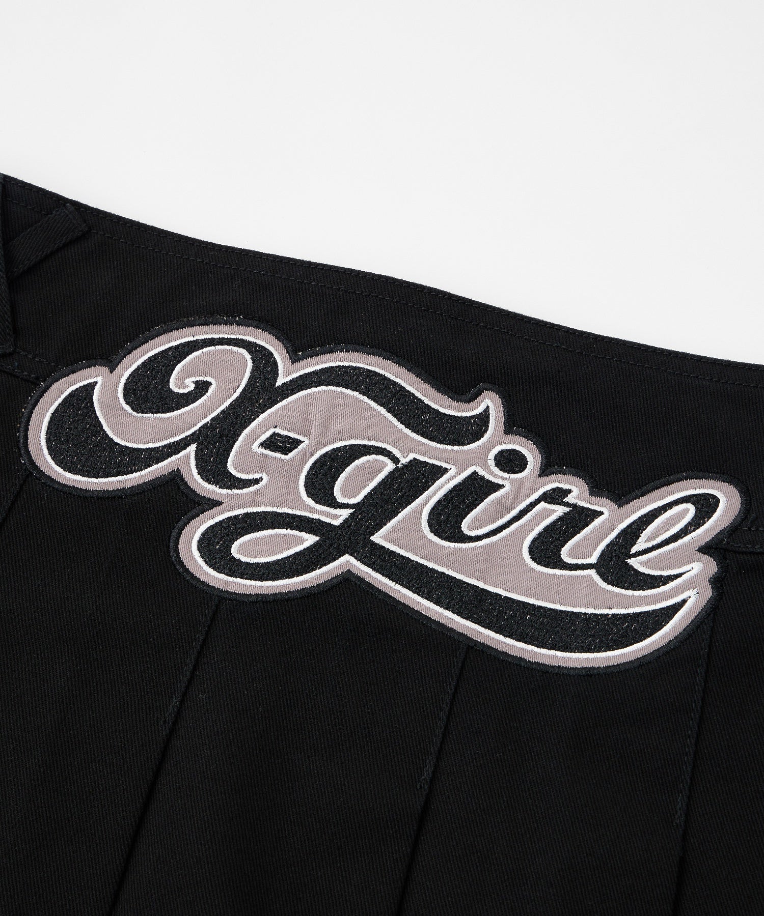 LOW RISE HIP LOGO MINI SKIRT