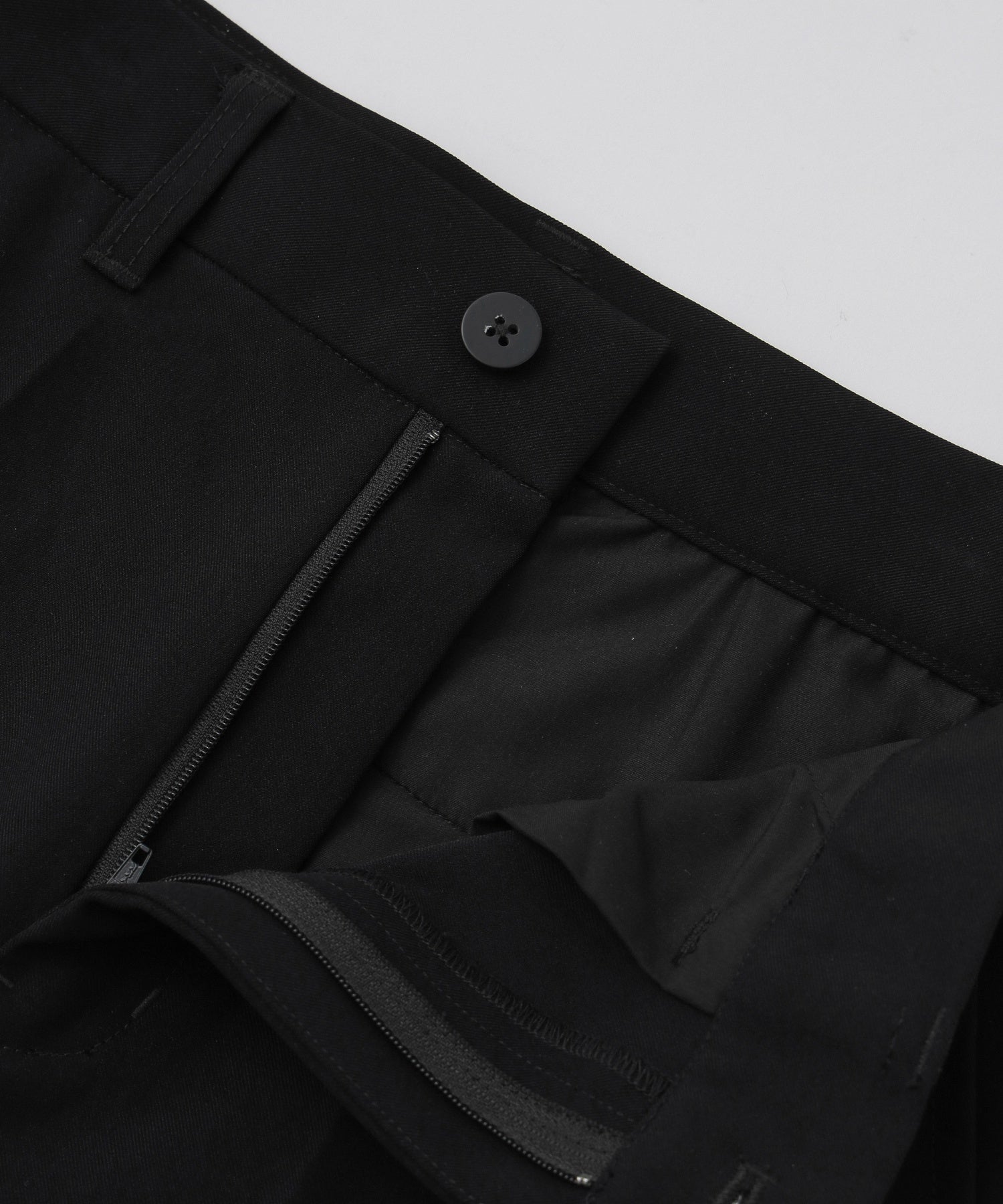 CURVED CUT PANELED PANTS