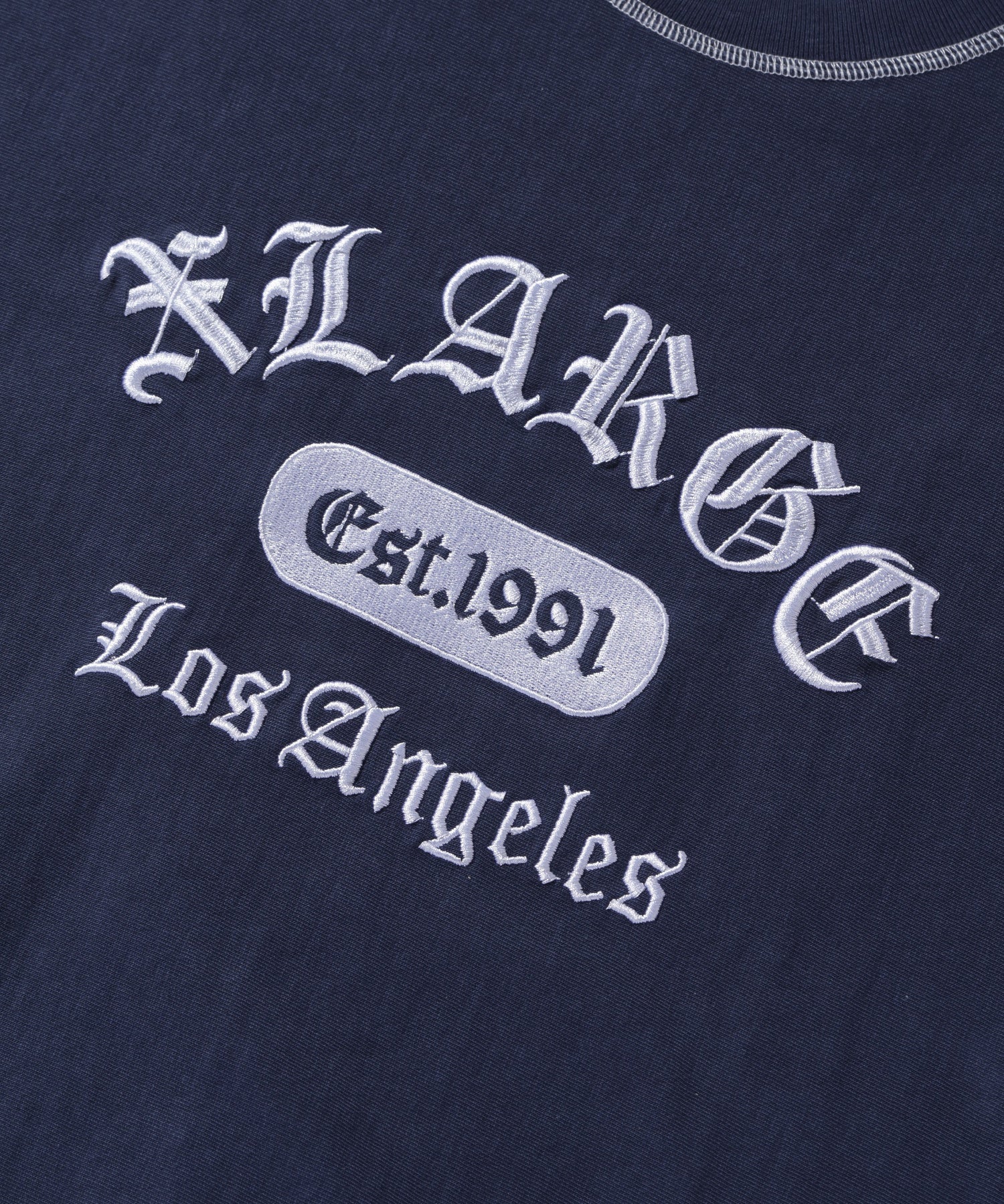 XLARGE×Champion REVERSE WEAVE STICHED S/S TEE