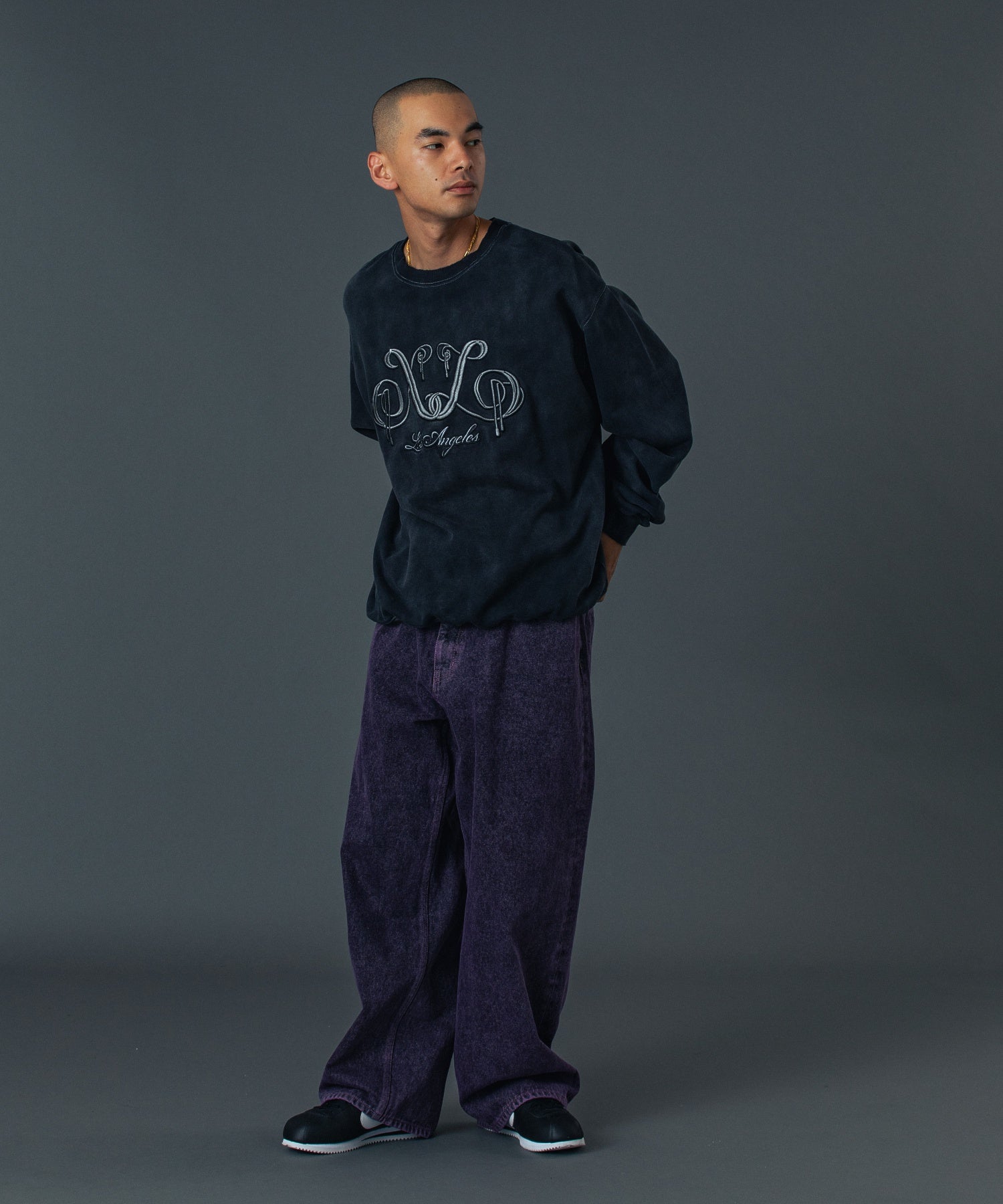 EMBOSSED DENIM PANTS