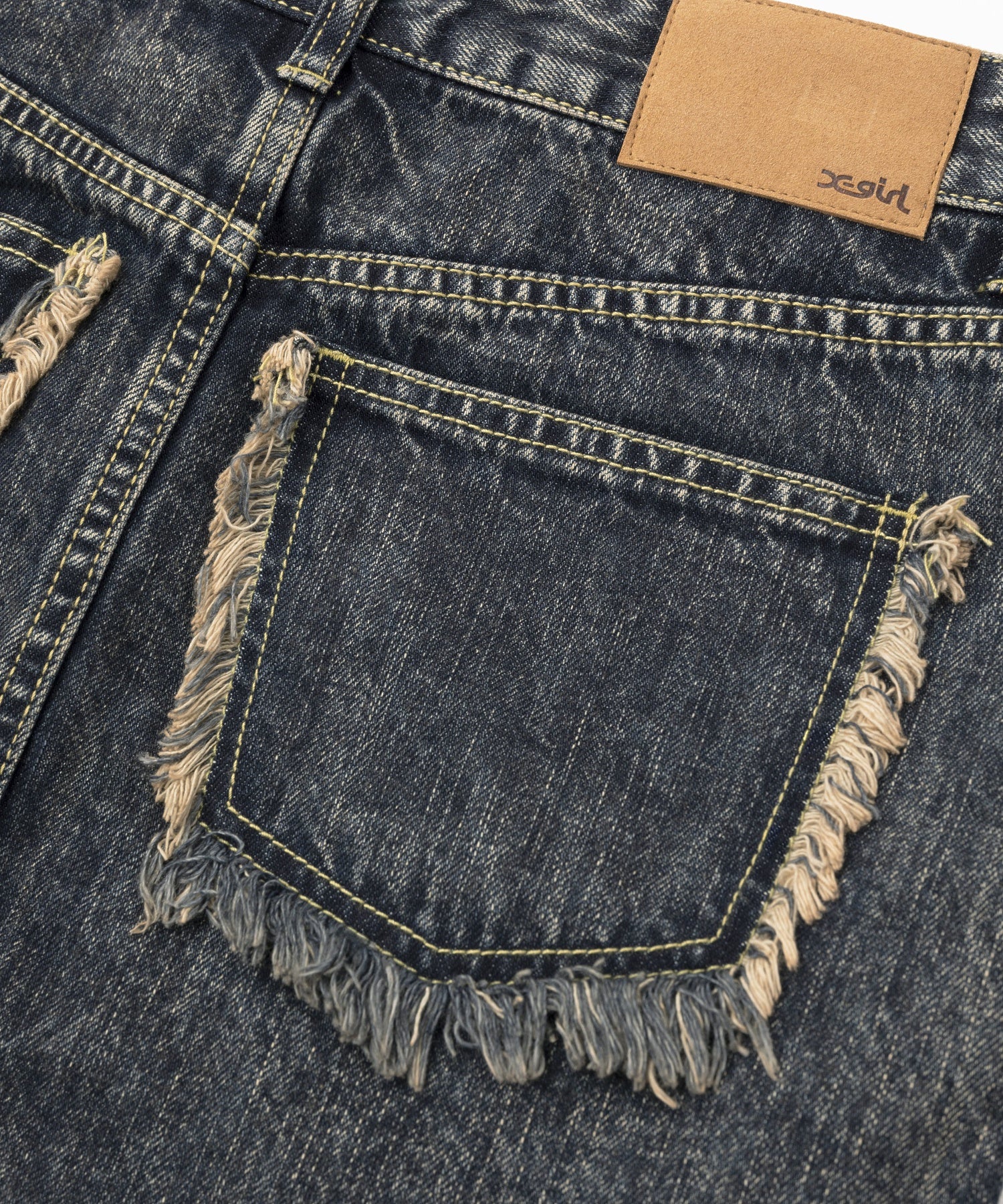 DISTRESSED DENIM MINI SKIRT