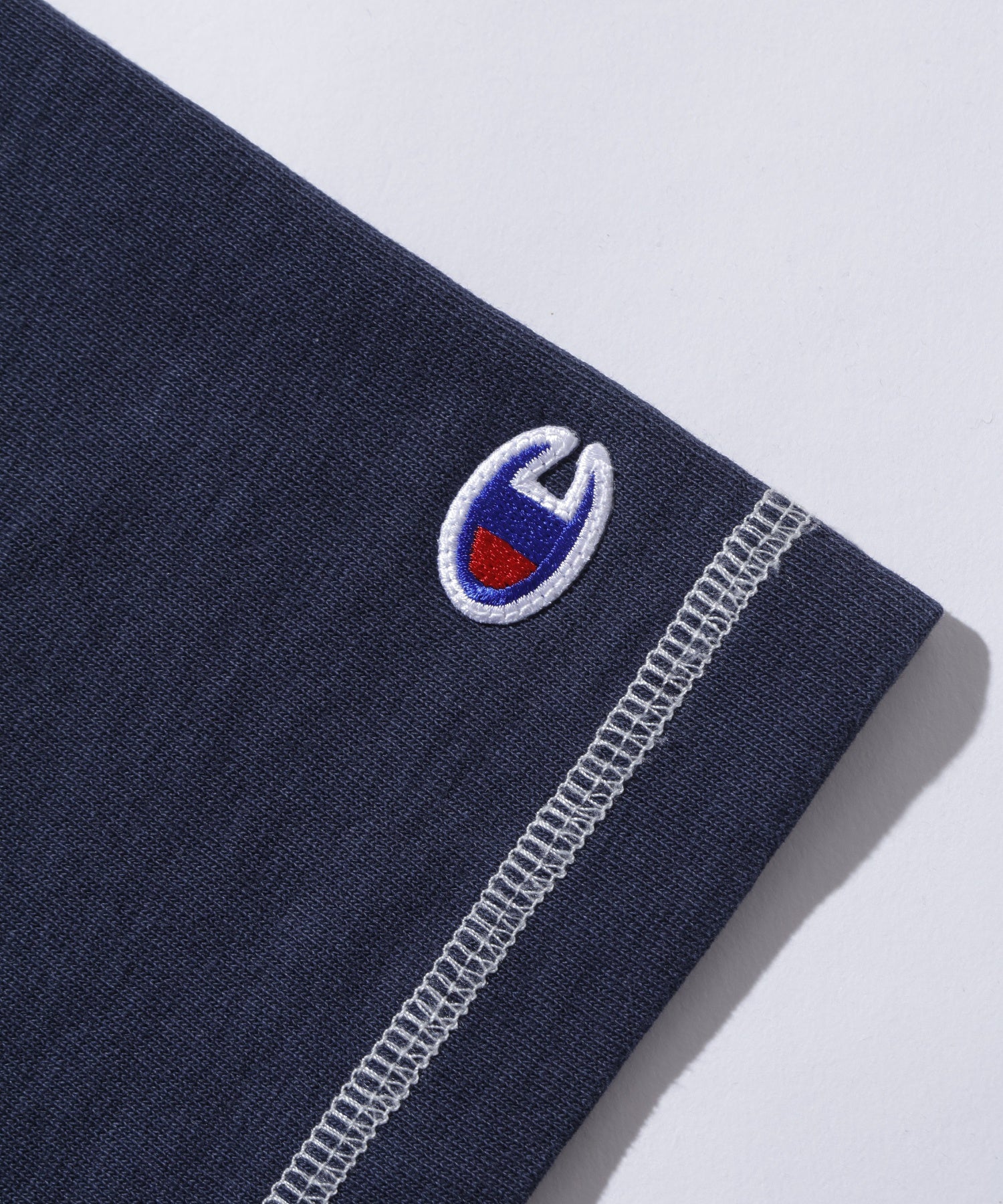 XLARGE×Champion REVERSE WEAVE STICHED S/S TEE