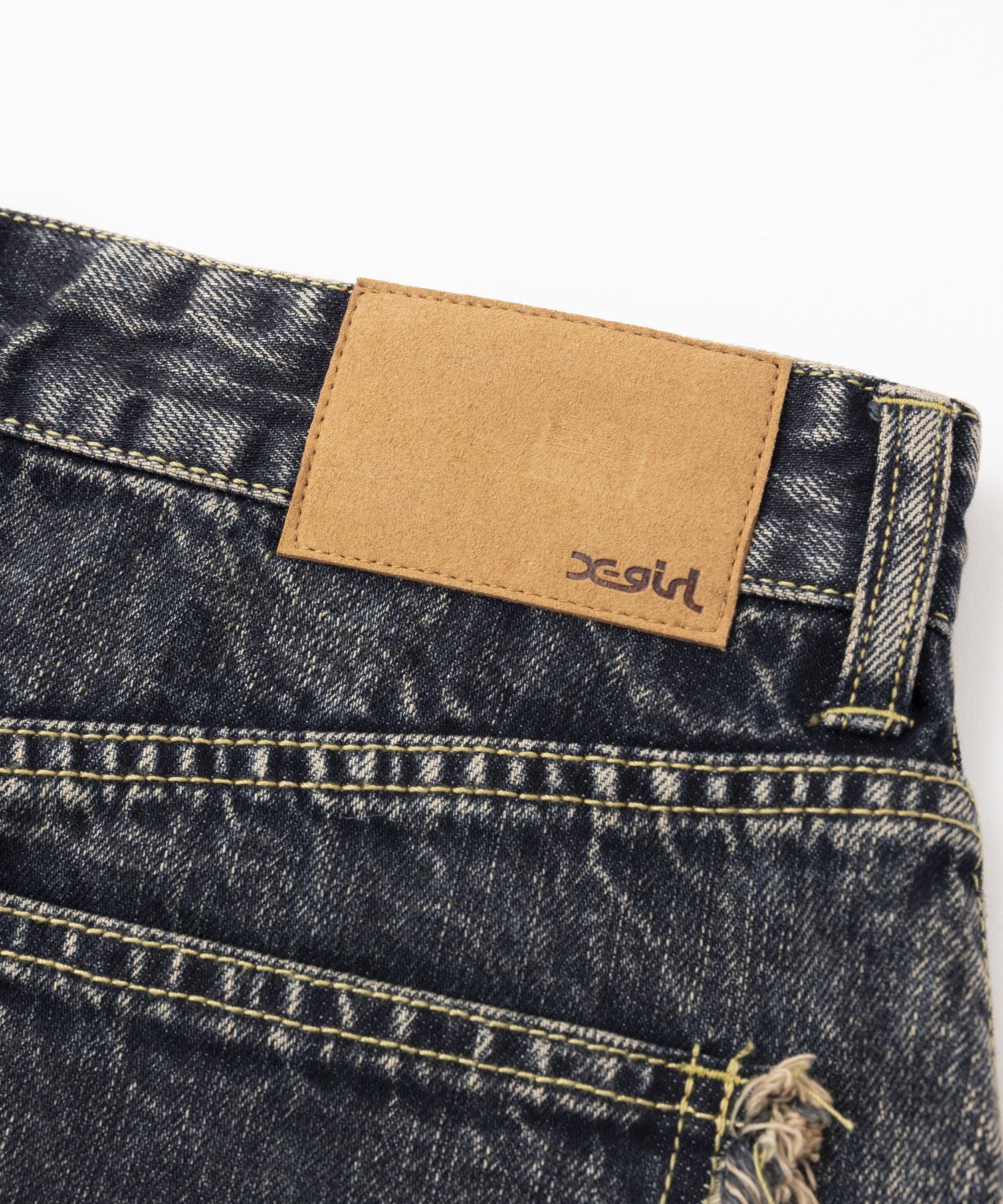 DISTRESSED DENIM MINI SKIRT