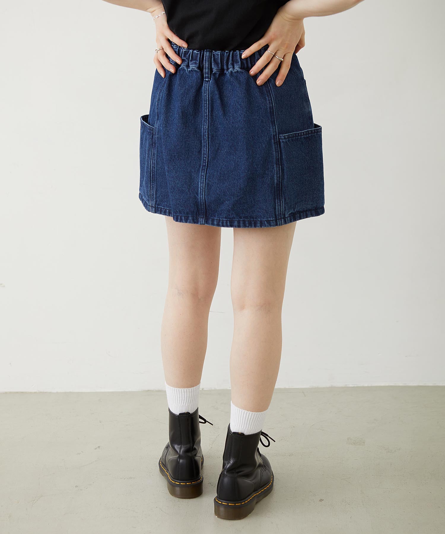 PANELED POCKET DENIM MINI SKIRT