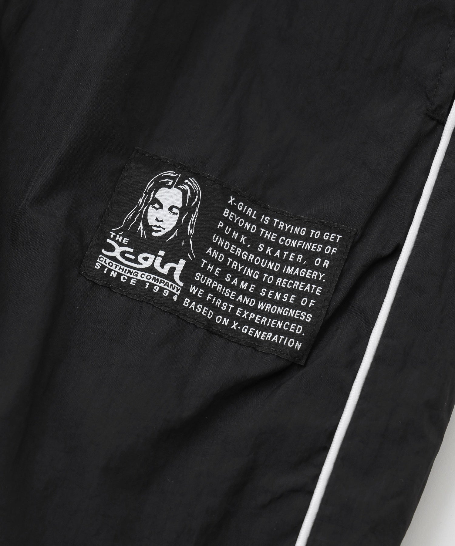 FACE LABEL TRACK PANTS