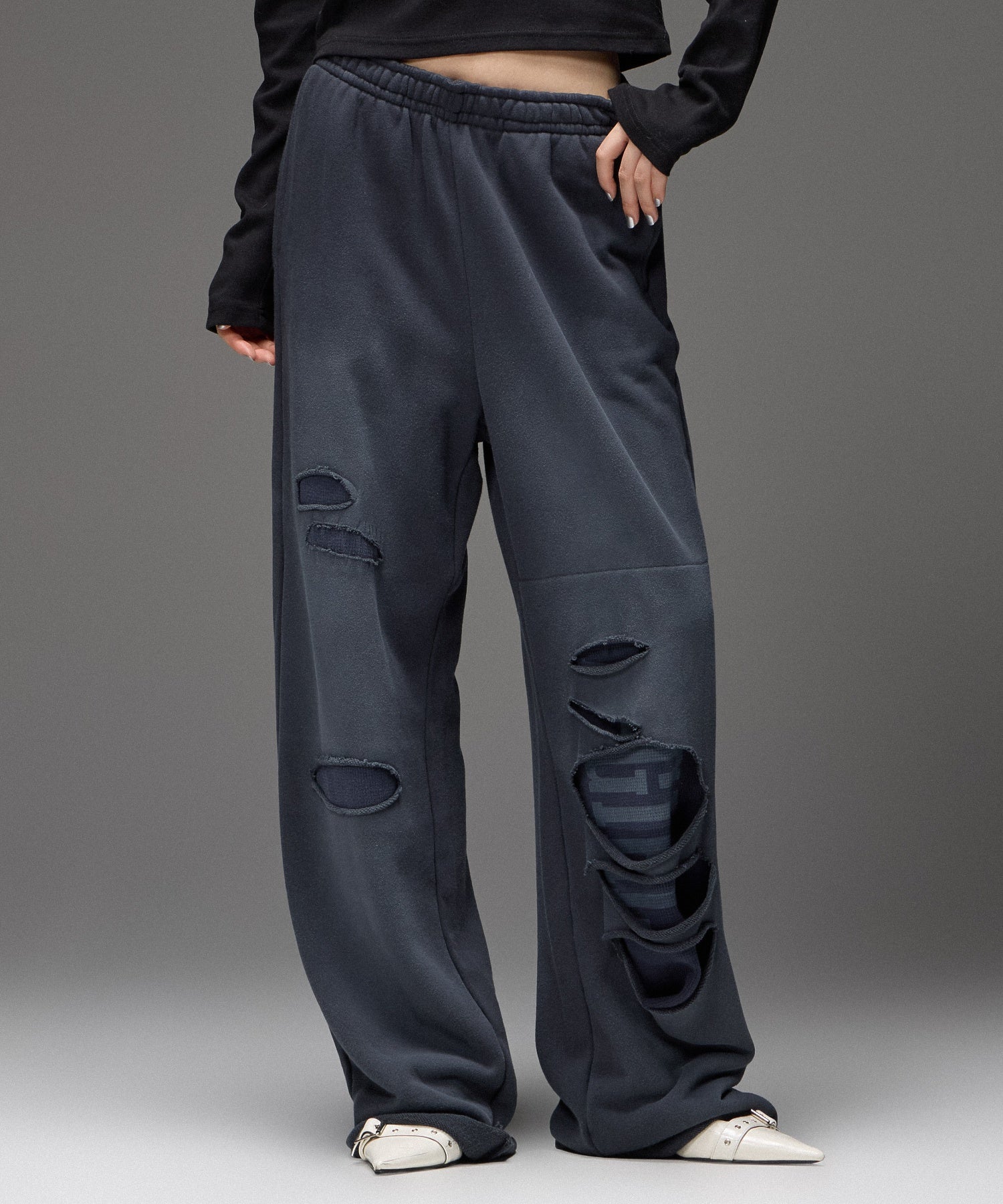 LAYERED DISTRESSED SWEATPANTS