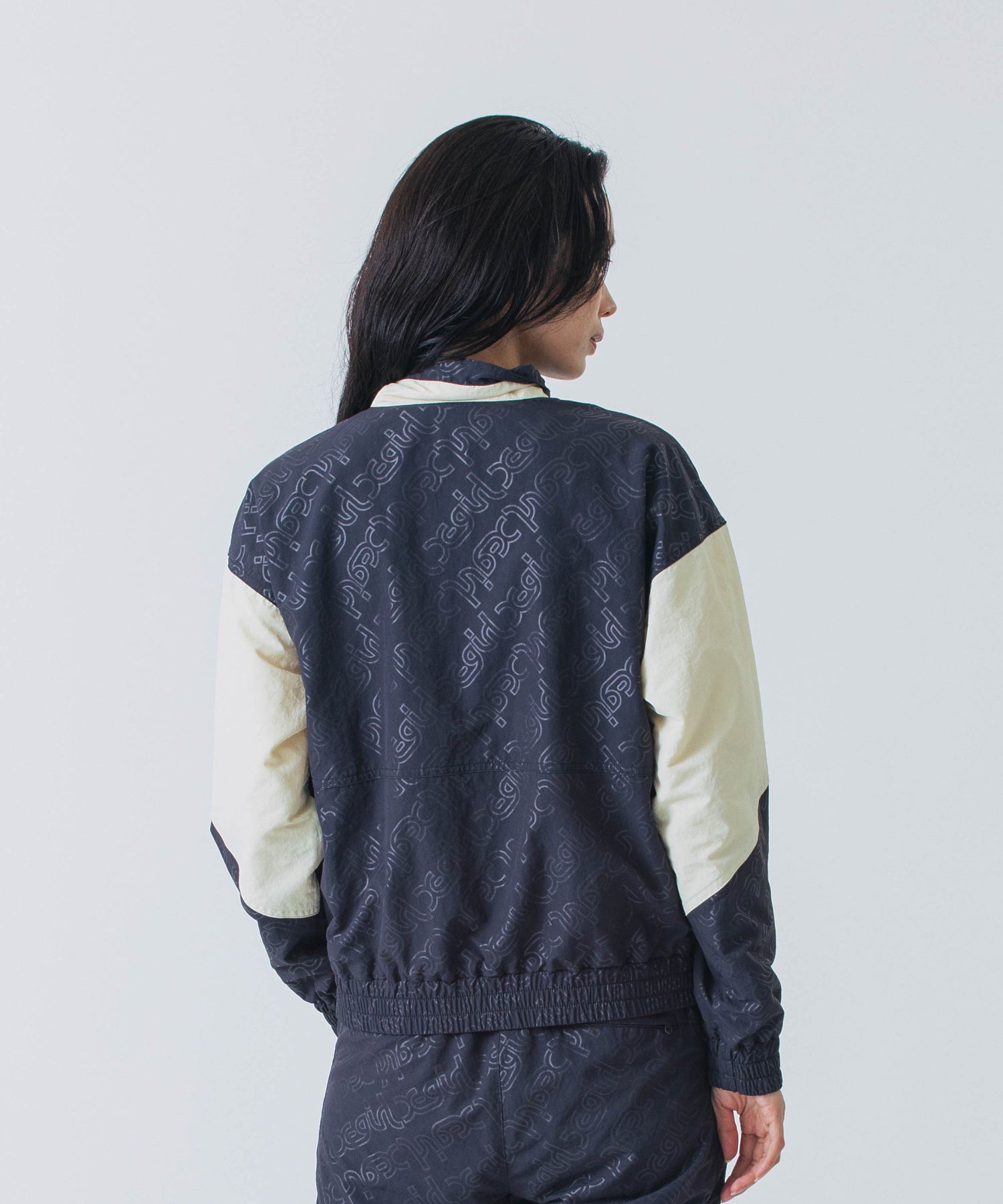 EMBOSSED WIND UP JACKET