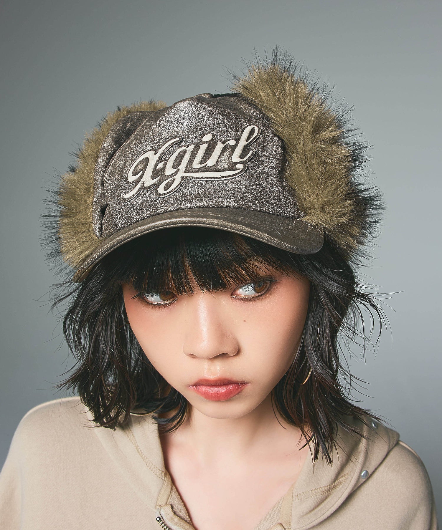 EMBOSSED LOGO PATCH EARFLAP CAP