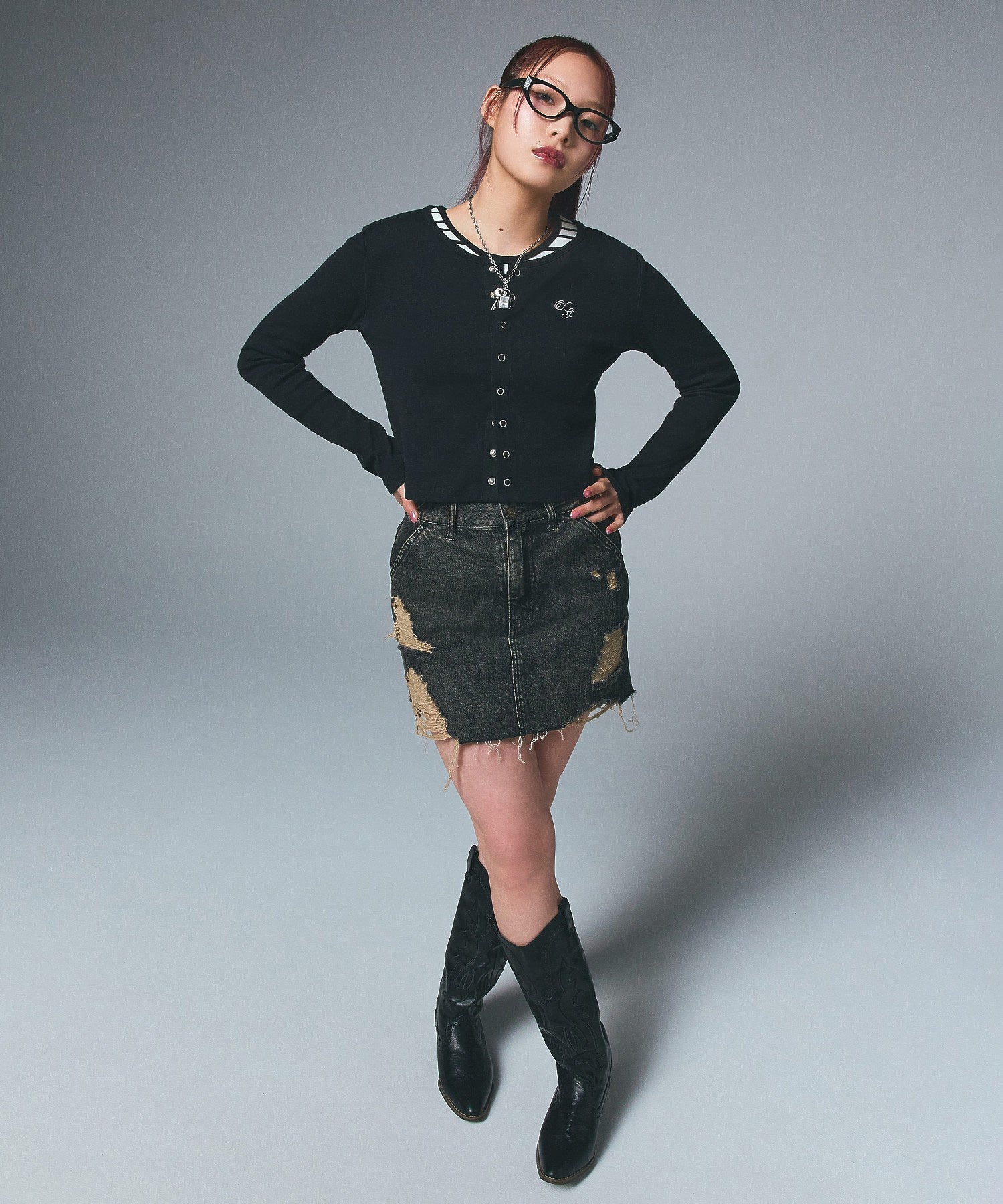 DISTRESSED DENIM MINI SKIRT